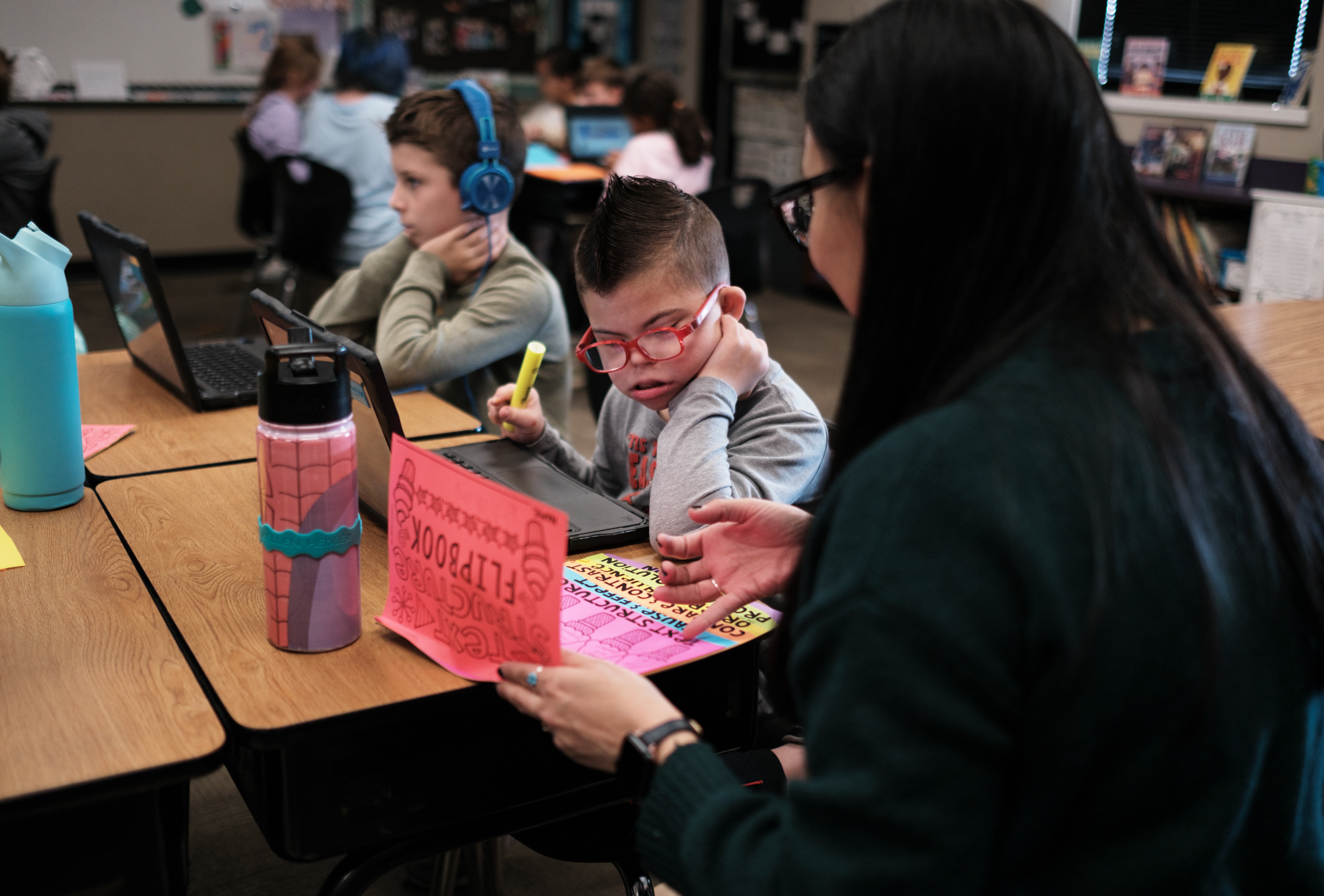Kellen and his classmates, including his best friend, Nolan Robbins (left), learn about the structure of the U.S. government with teacher Robyn Fox.
