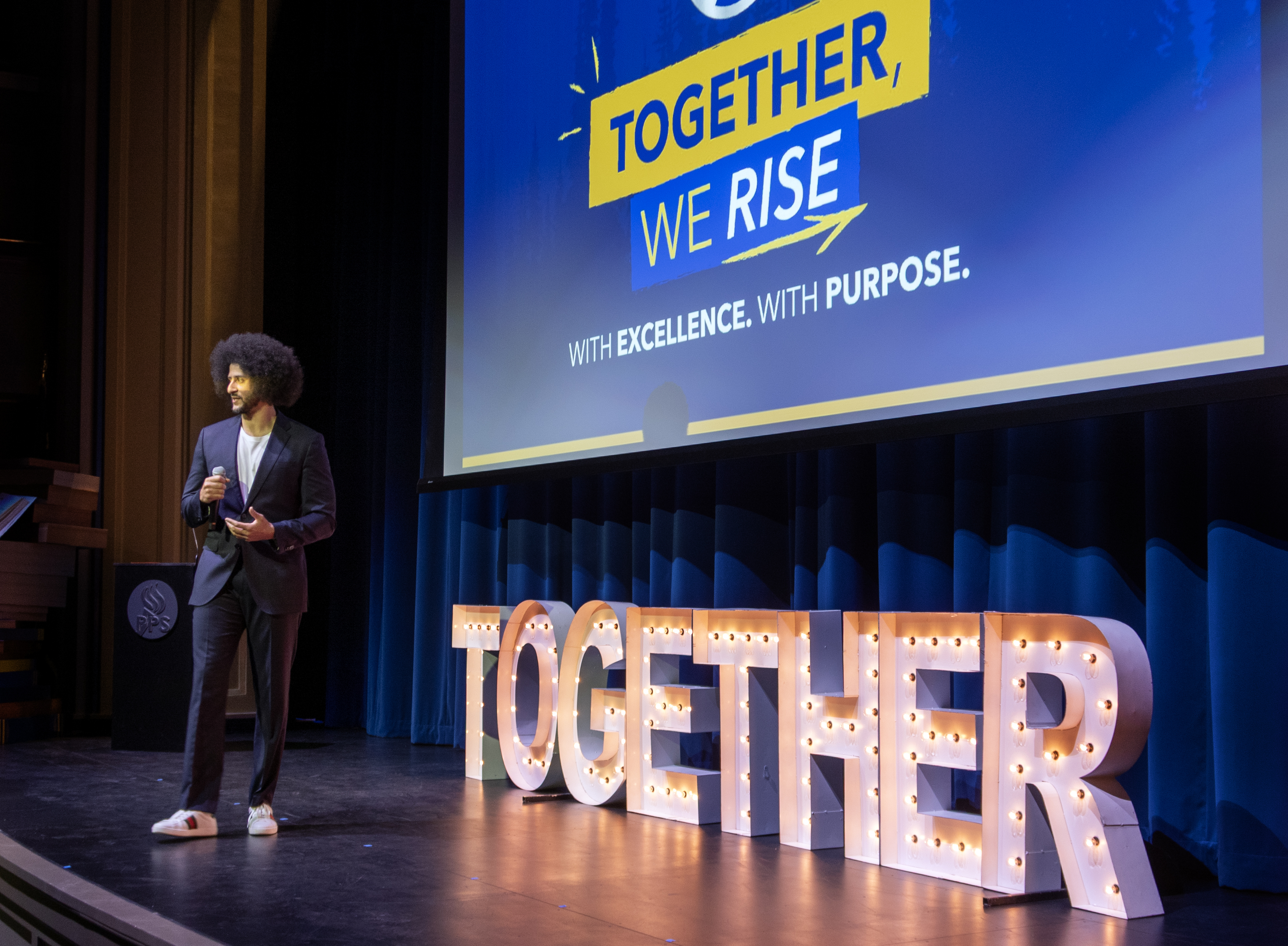 Former NFL player and AI company founder Colin Kaepernick speaks to a group of educators and students at Benson Polytechnic High School in Portland, Ore., on Aug. 6, 2025.