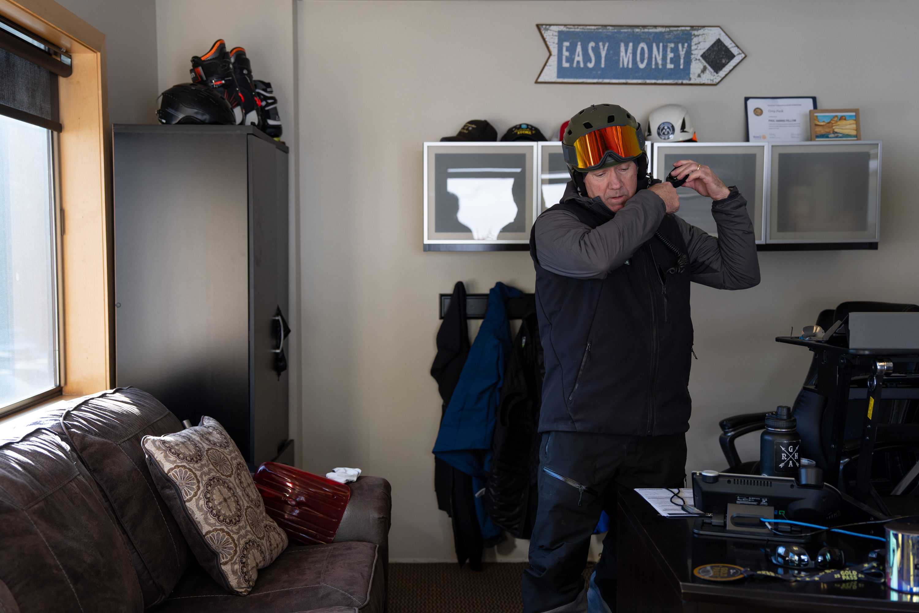 Mt. Hood Meadows president and general manager Greg Pack fastens his radio to his vest as he gets ready to ski on the mountain.