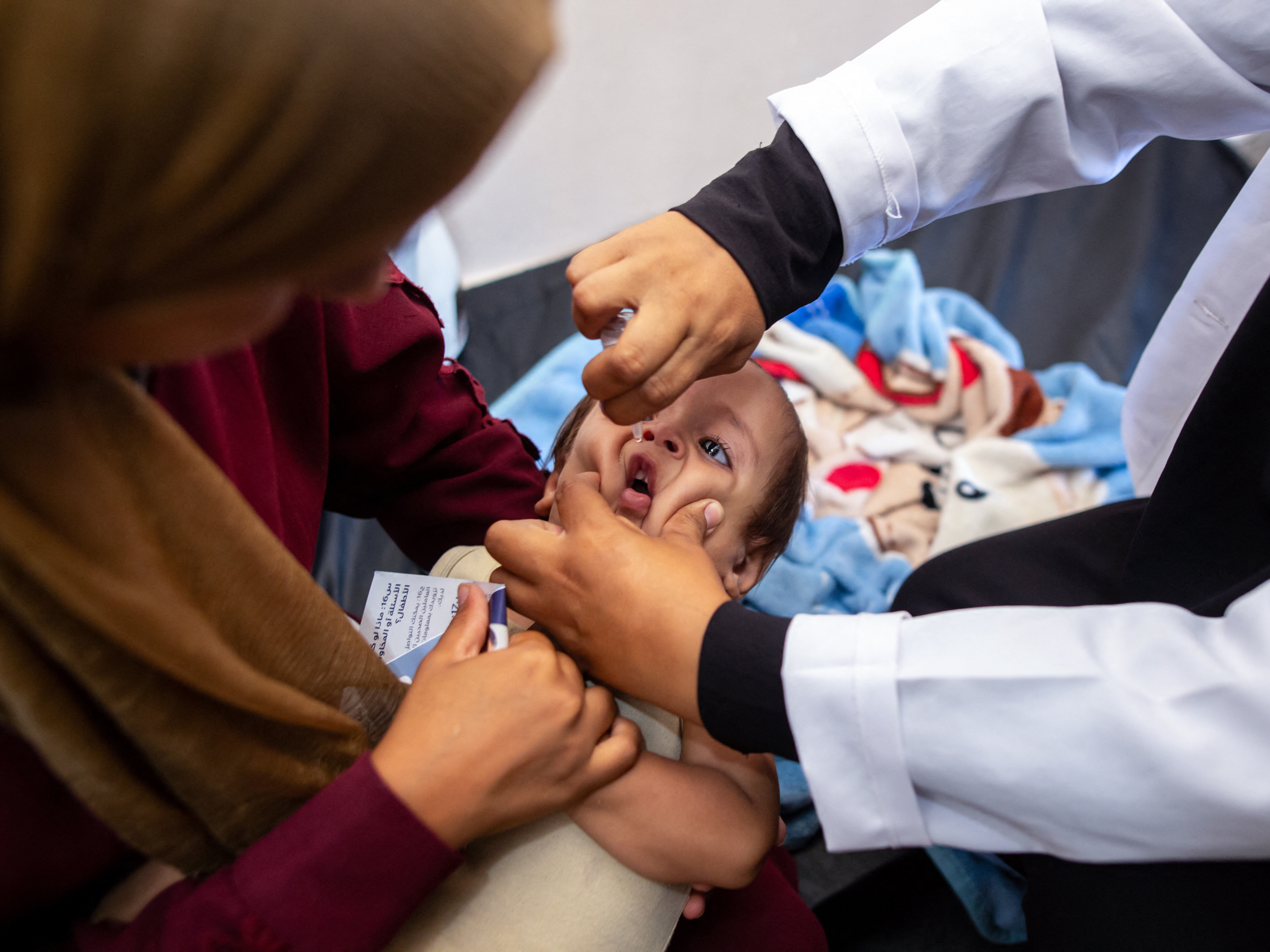 As polio vaccinations begin in Gaza, U.N. says success hinges on a pause in  fighting - OPB