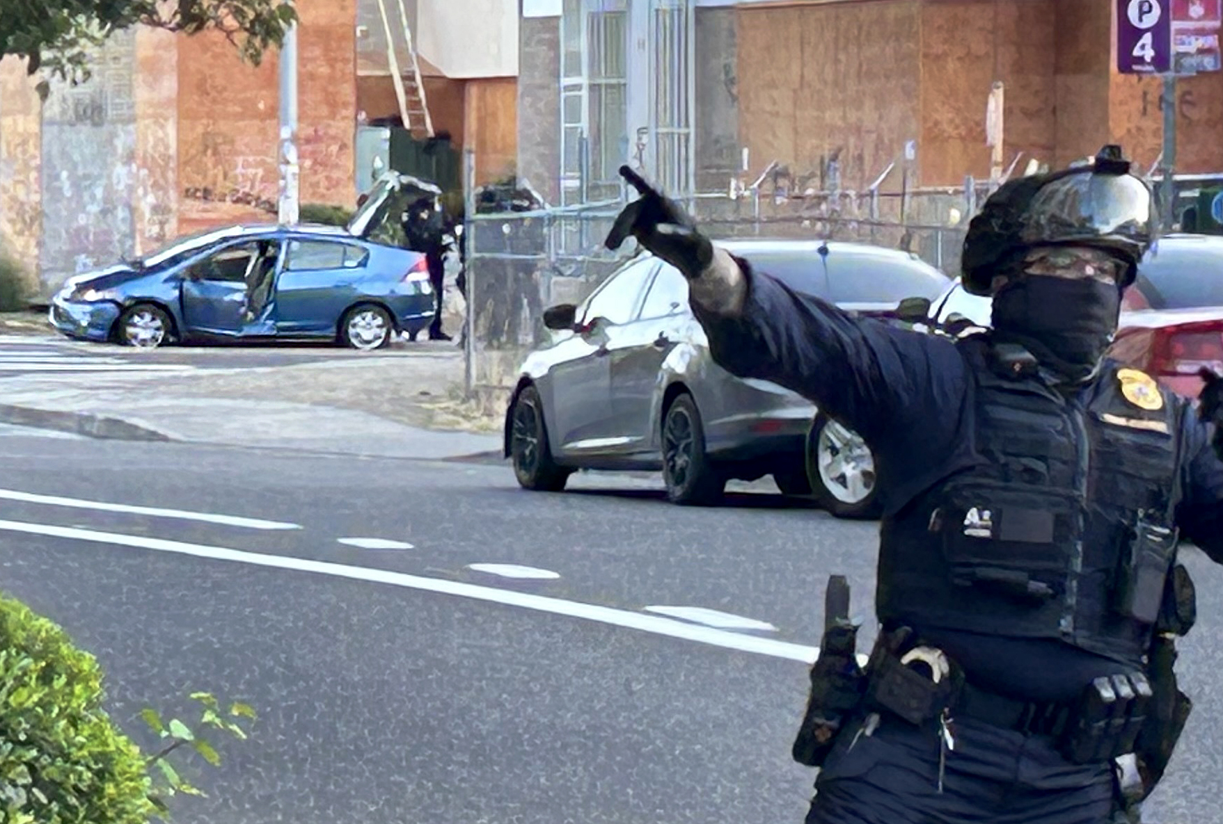 Dozens of federal officers closed the roads surrounding the U.S. Immigration and Customs Enforcement building in Portland, Ore. on Aug. 18, 2025, after a woman “intentionally parked her blue sedan to create an obstacle to the entryway” and proceeded to “quickly abandon her vehicle,” according to an ICE spokesperson. No one was injured.