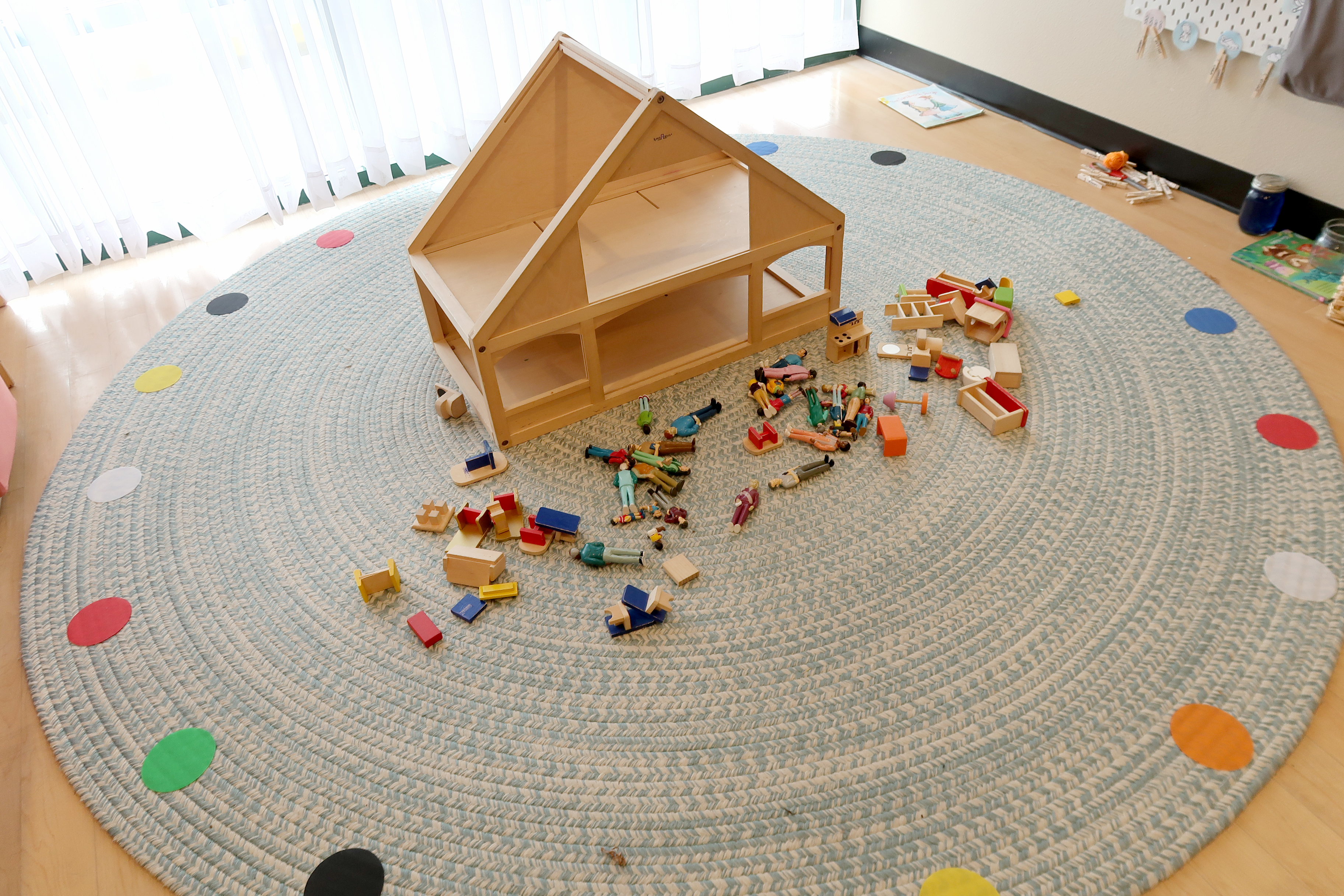 Toys on a rug in a toddler classroom at Small Wonders Hollywood, a pre-K and child care center.