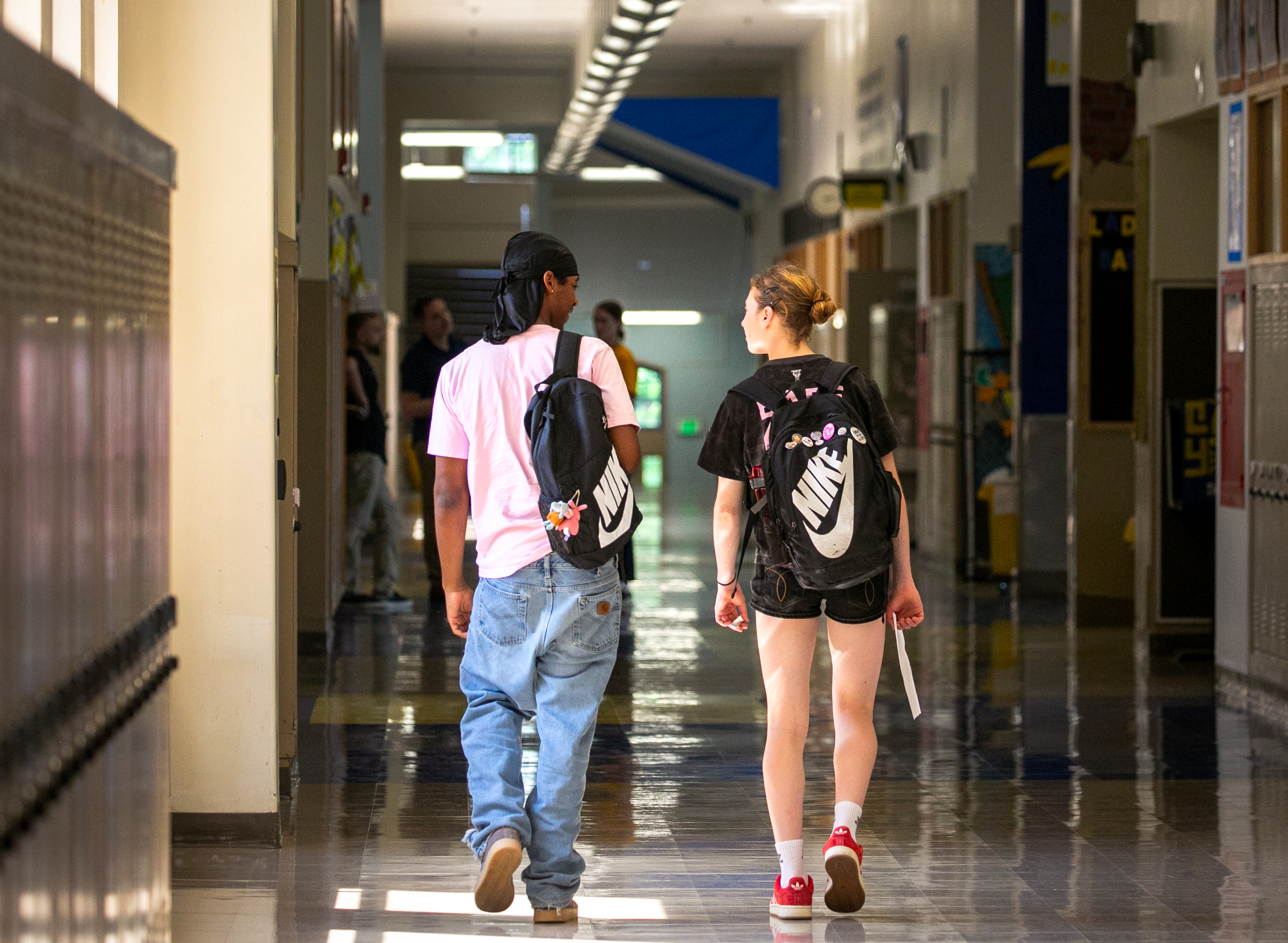 FILE - Two Jefferson High School students walk to lunch together in Portland, Ore., Aug. 26, 2025.