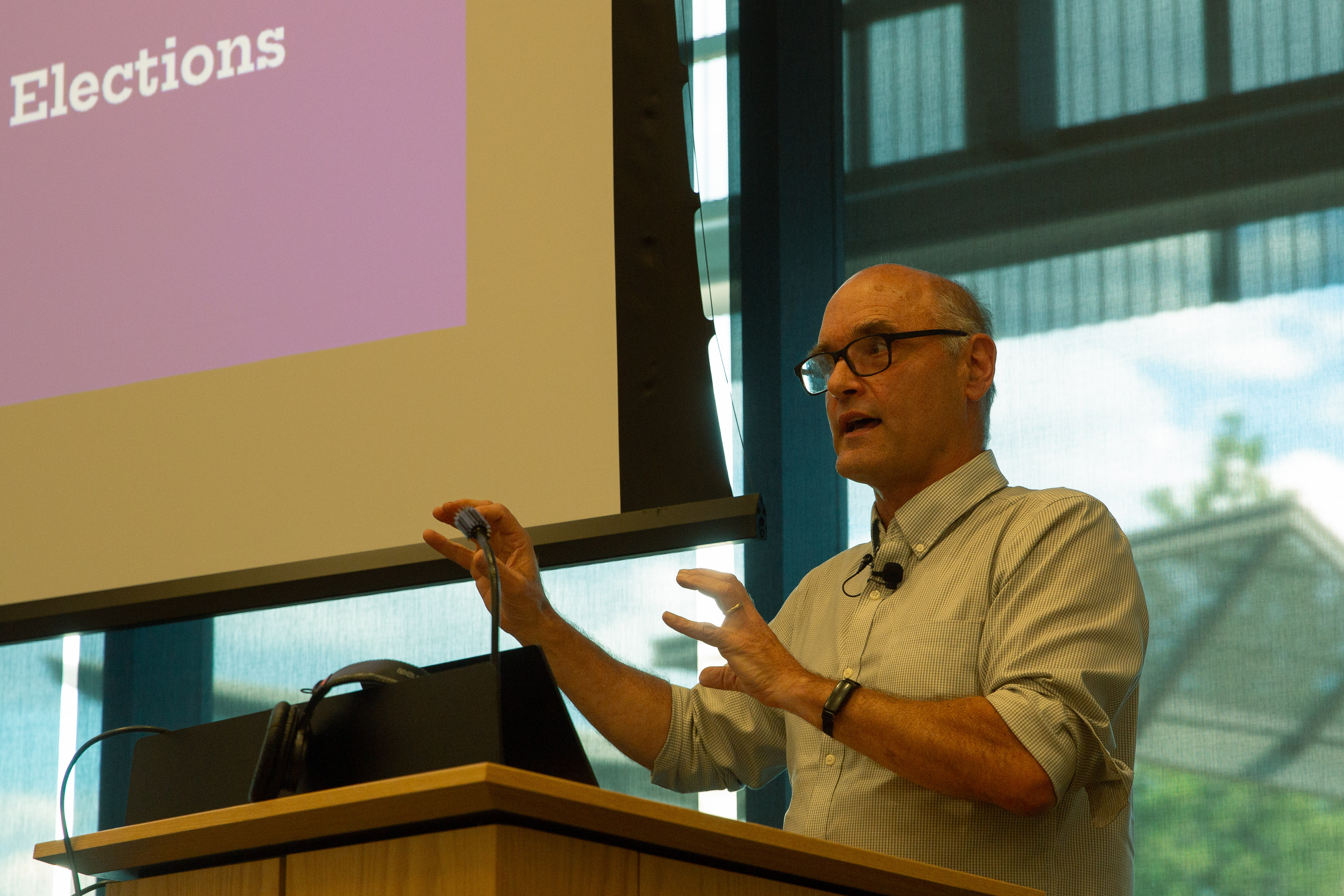 Rob Richie explains ranked-choice voting to a full house at the Deschutes Central Library in Bend, Ore., on July 13, 2026.