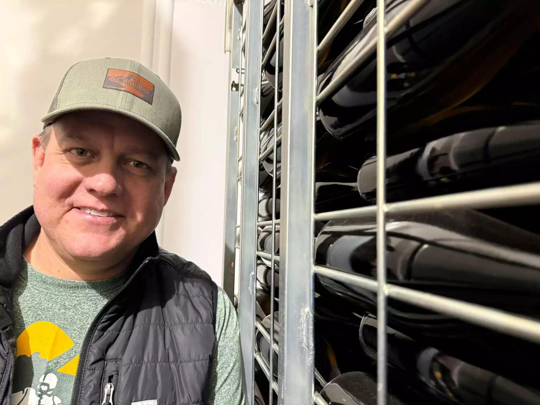 Corey Braunel leans into his sparkling work at Dusted Valley winery in Walla Walla, Wash., in an undated photo.