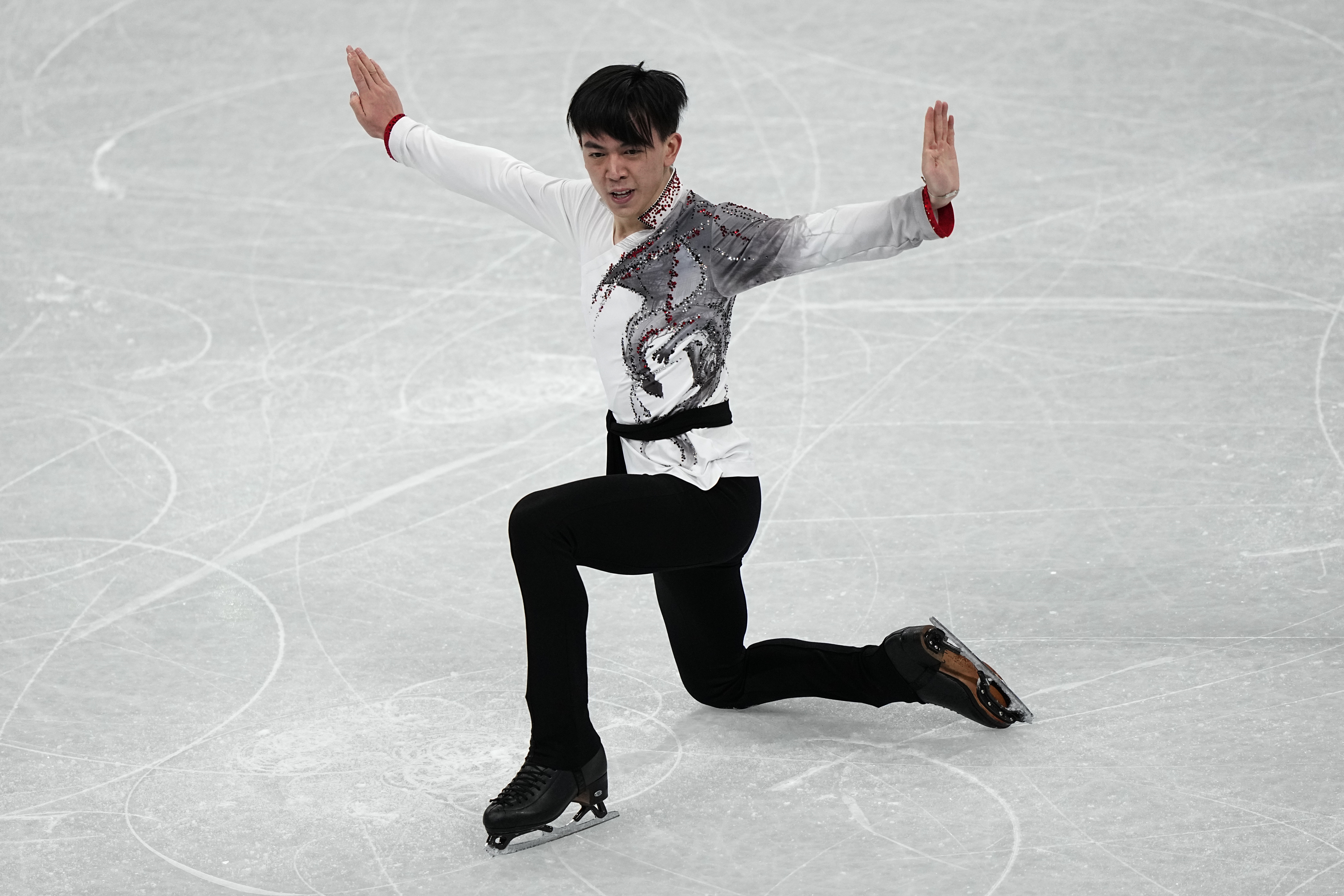 Vincent Zhou out of Olympics figure skating with COVID-19 positive test
