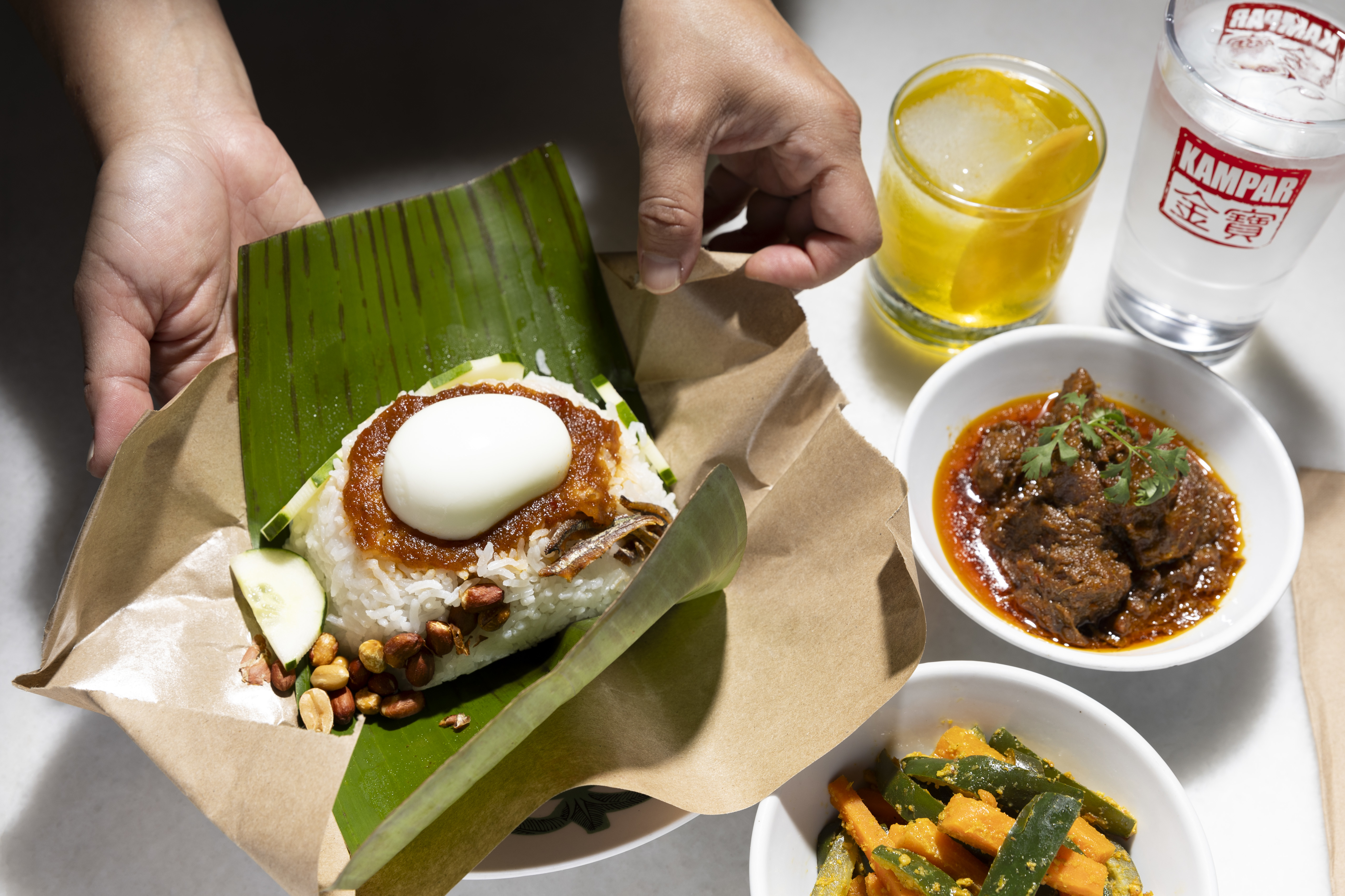 Nasi Lemak with add-on Achat and Rendang Daging at Kampar in Philadelphia on Thursday, July 11, 2024. Kampar is located at 611 South 7th Street.