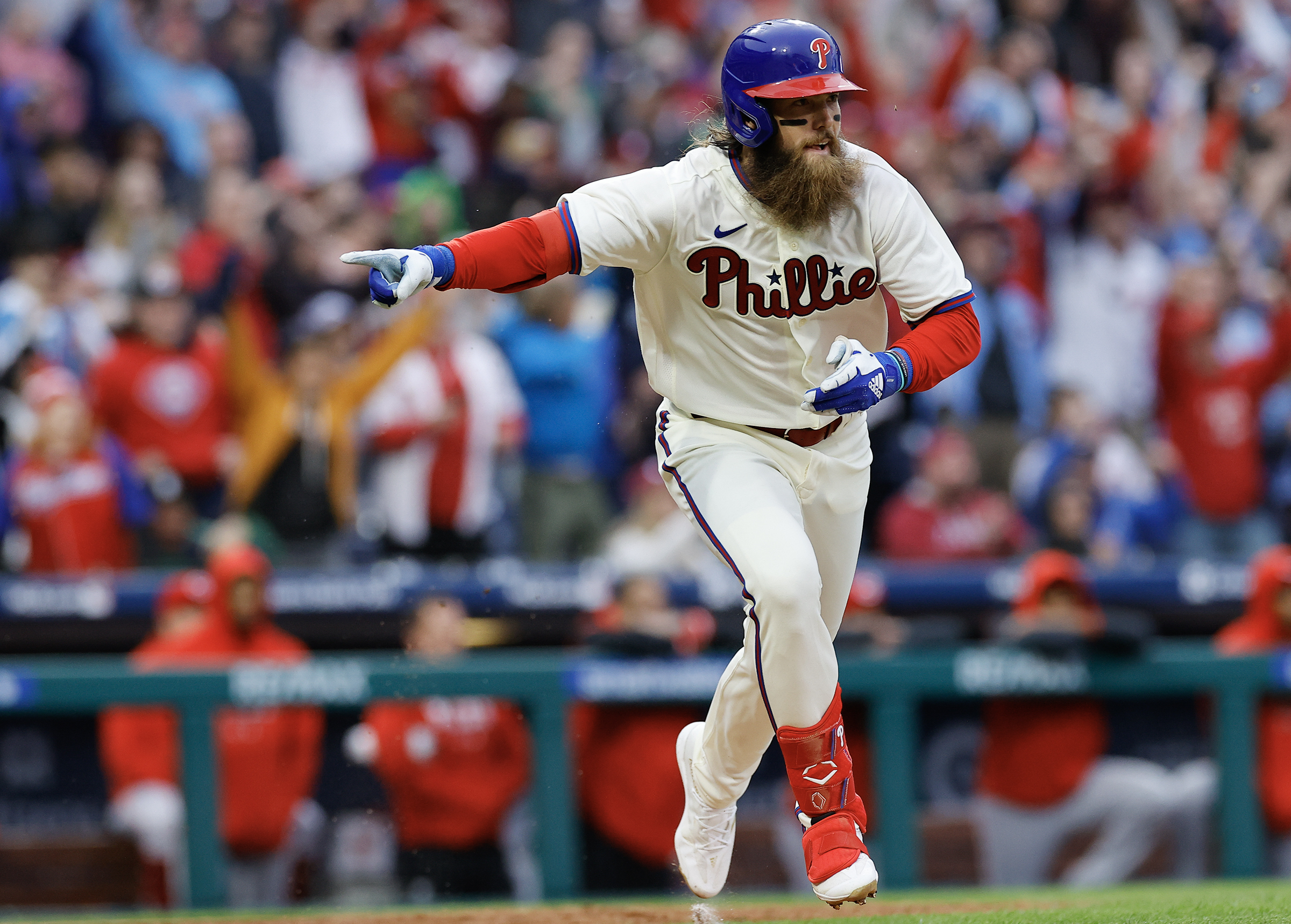 A ninth-inning rally fuels a 3-2 Phillies win over the Reds and revives a  packed Citizens Bank Park