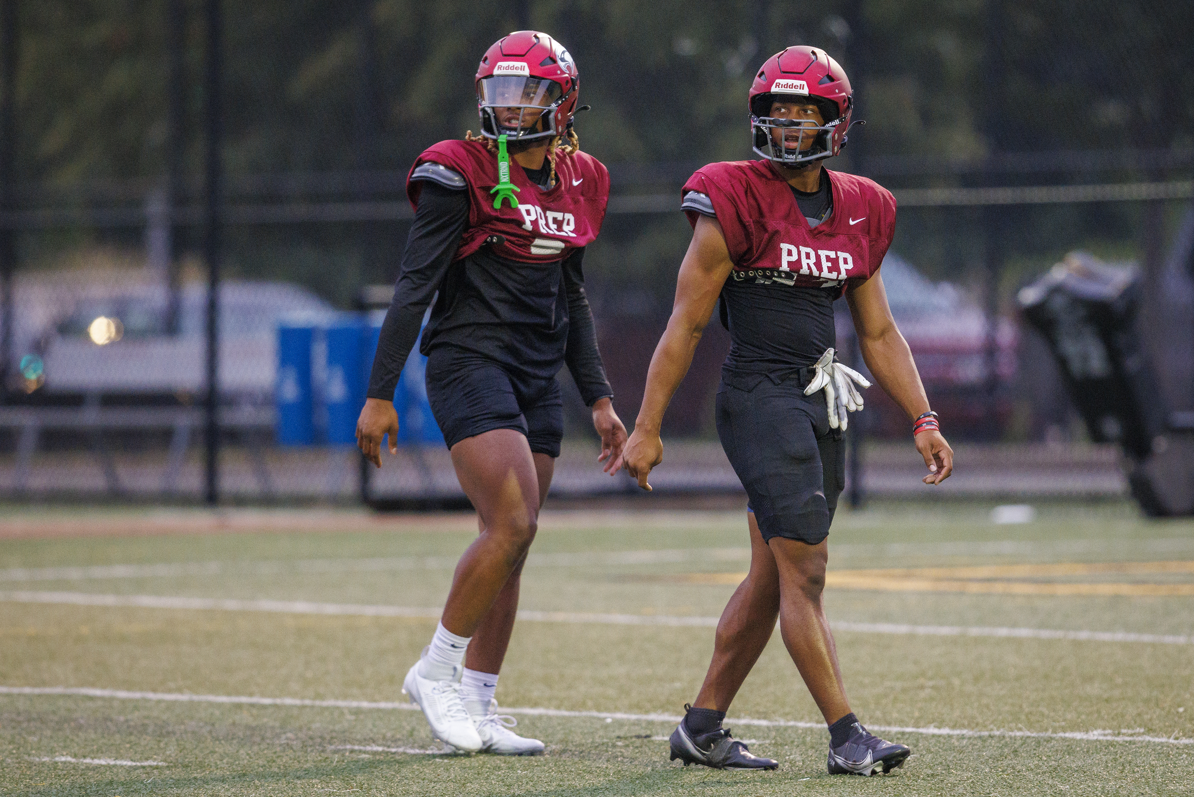 Ex-CR Wash football star helps kids get ready for new school year