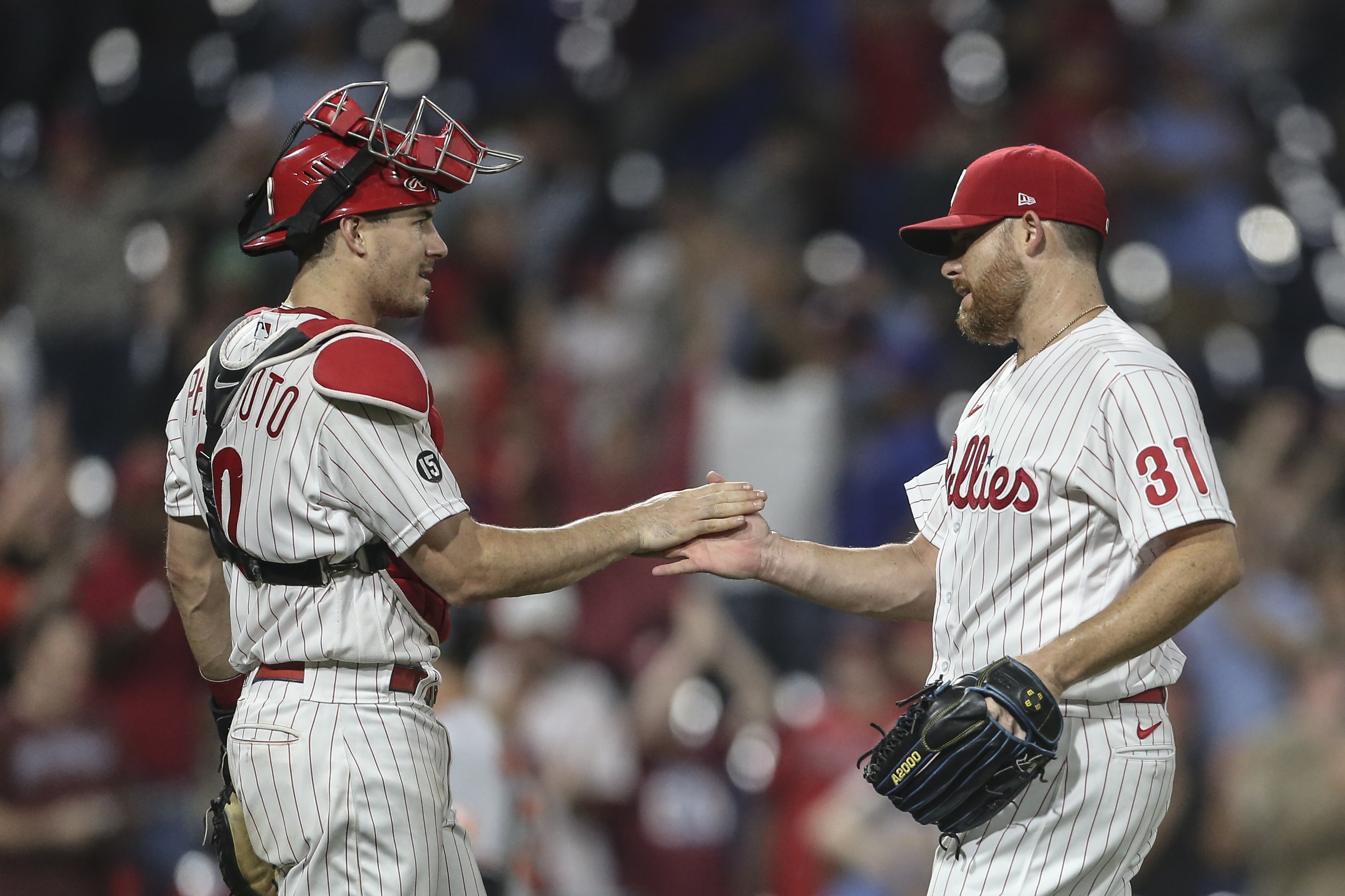 Harper's throw to plate saves Phillies' 4-3 win over O's