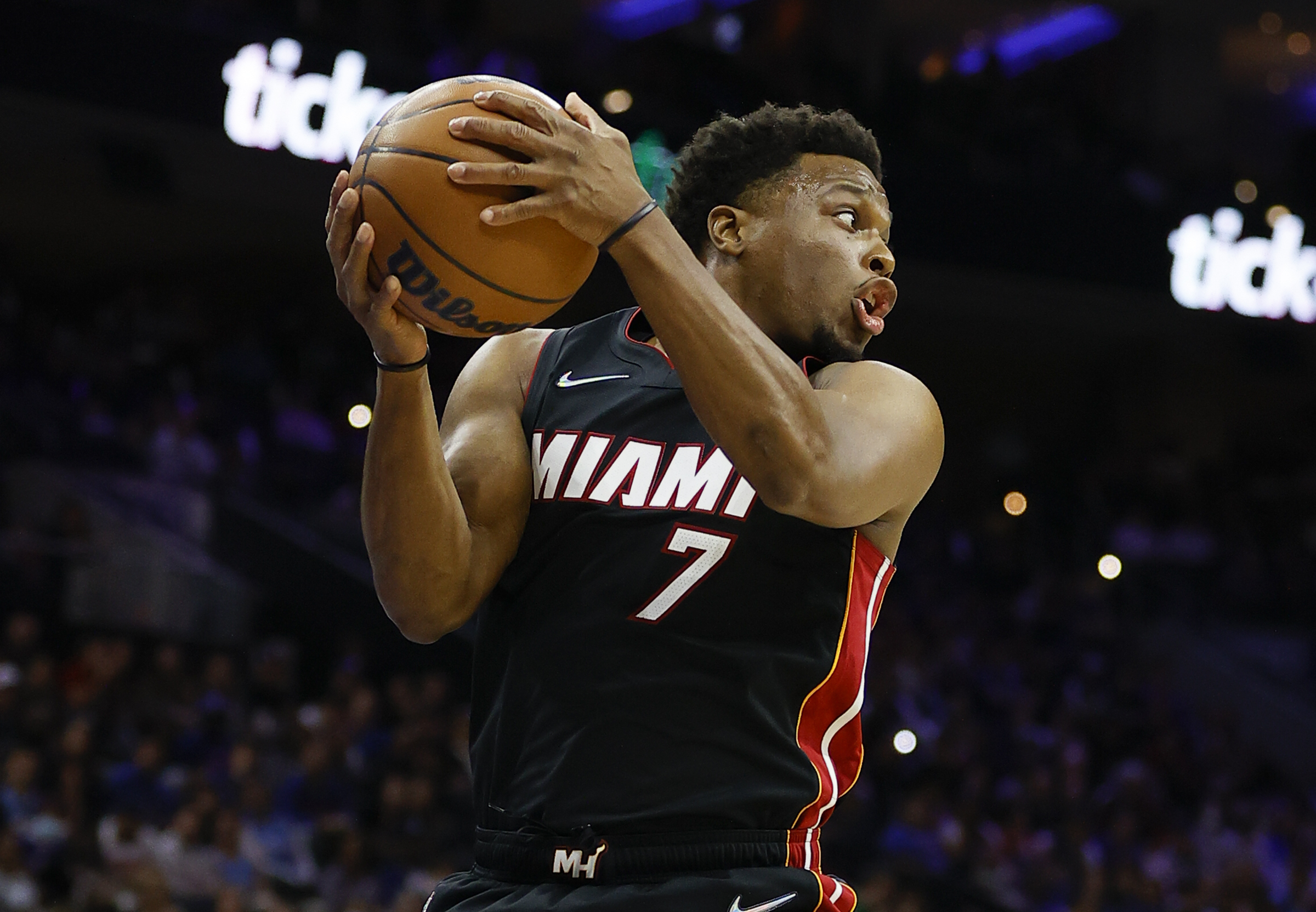Miami Heat guard Kyle Lowry (7) dribbles up the court during the first half  of Game 1 in the NBA basketball Eastern Conference semifinals playoff  series against the New York Knicks, Sunday