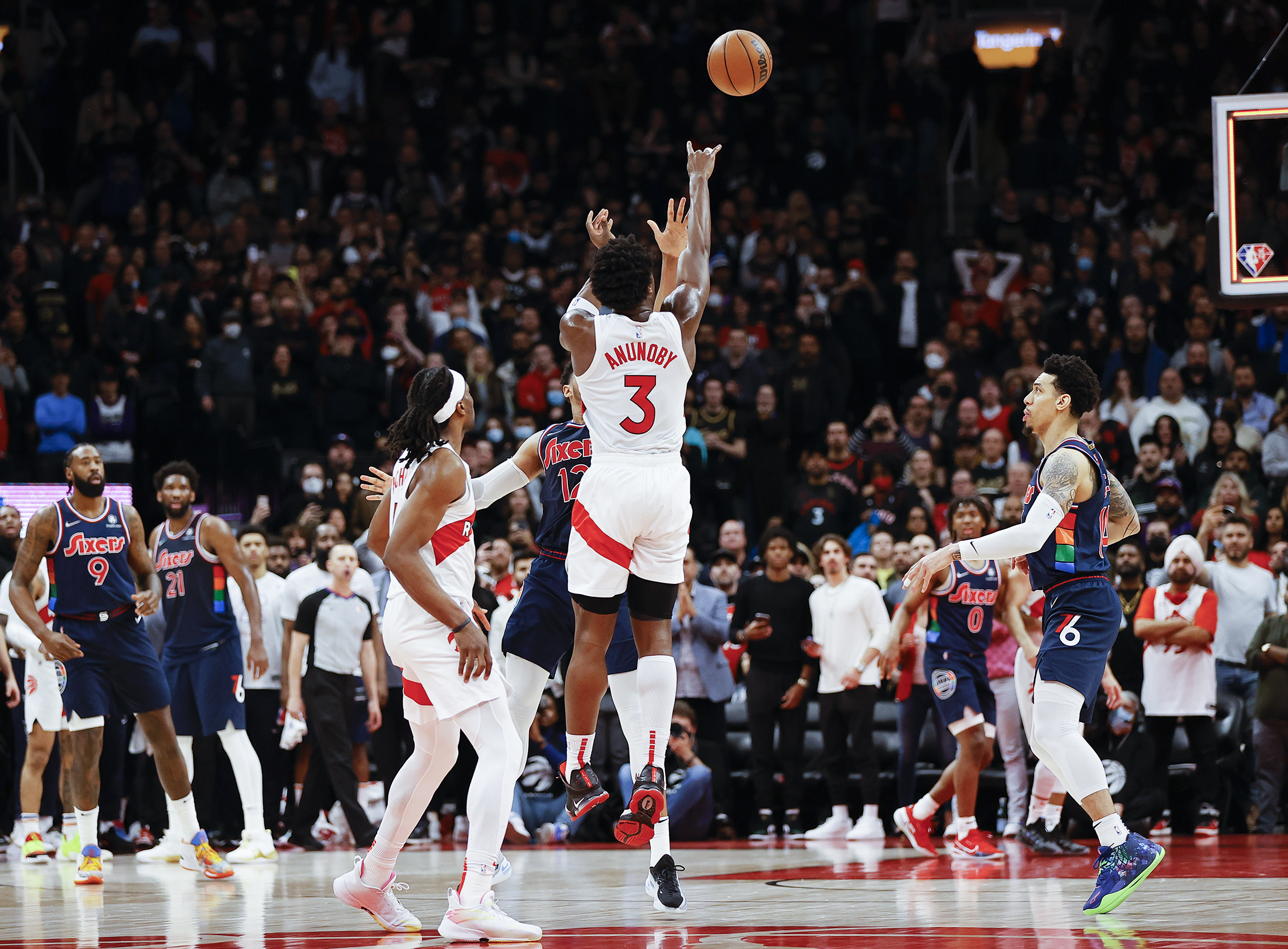 Philadelphia 76ers forward Tobias Harris (12) slams home a dunk over  Toronto Raptors forward Pascal Siakam (43) during first half NBA first  round playoff action in Toronto, Saturday, April 23, 2022. THE
