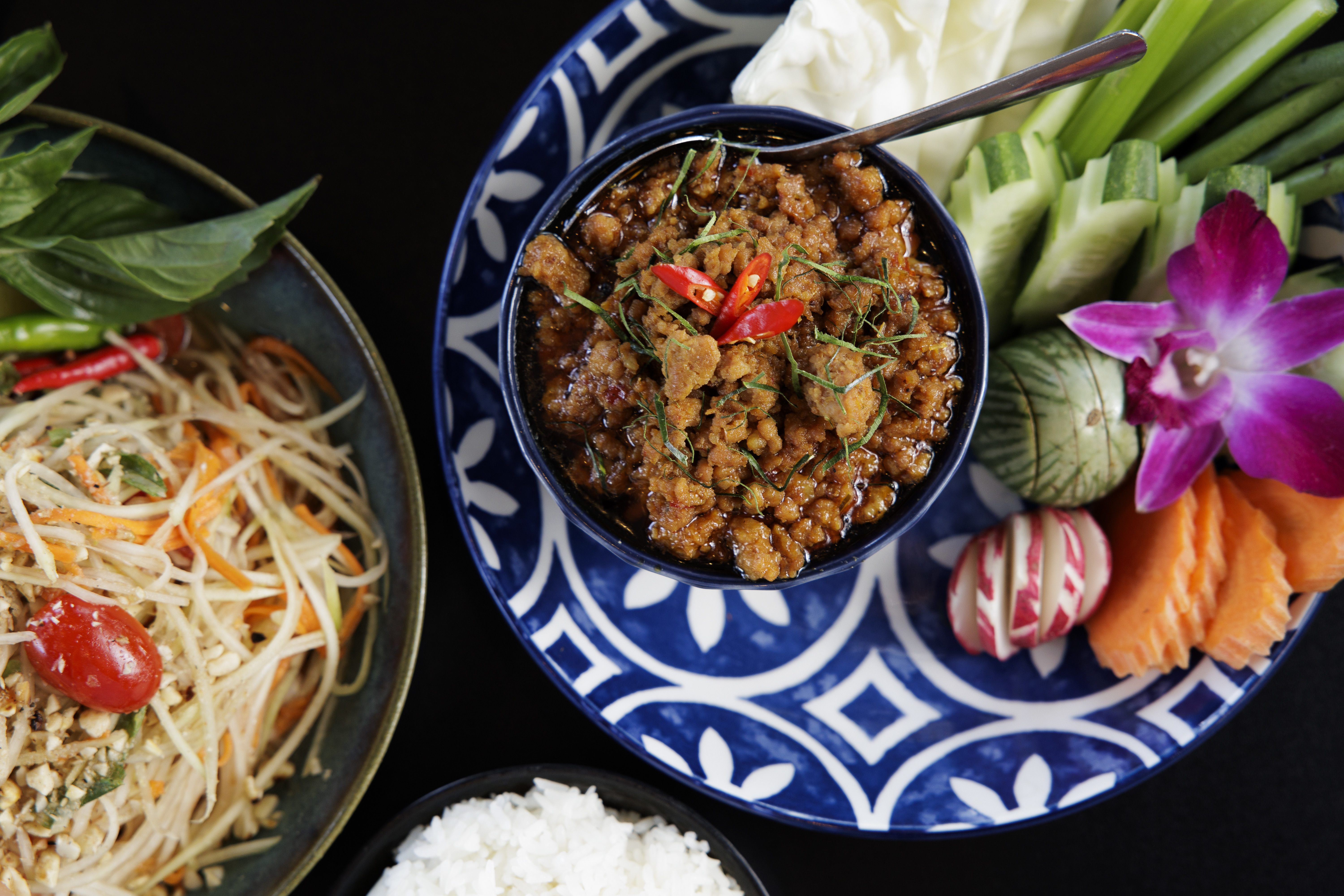 The Bok-Lahong, shredding papaya salad, and Praw Hok Kteah served with cruditie at Sophie’s Kitchen in Philadelphia on Thursday, Aug. 22, 2024.