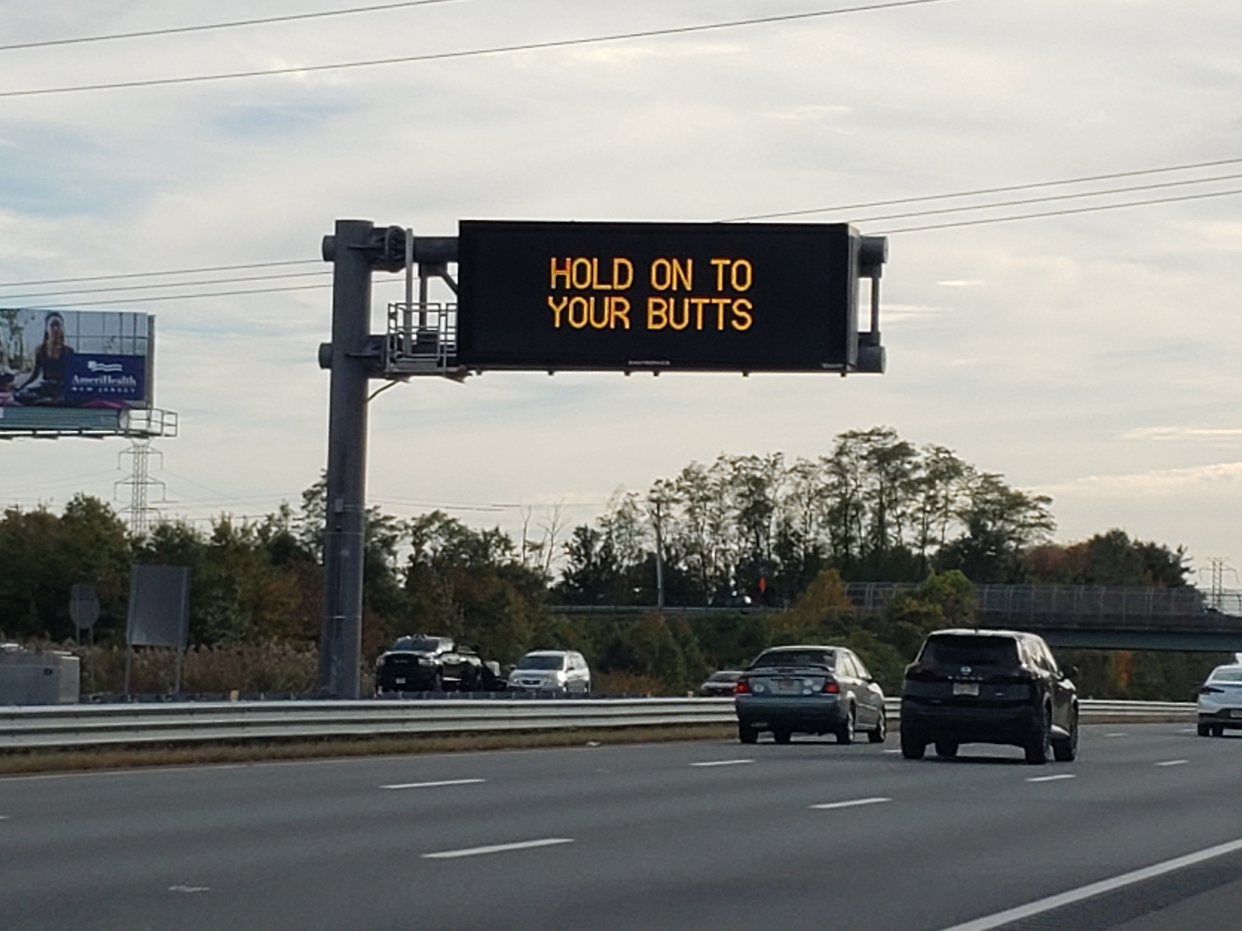 New Jersey's sassy traffic signs should stay, says Sen. Cory Booker, Rep.  Donald Norcross