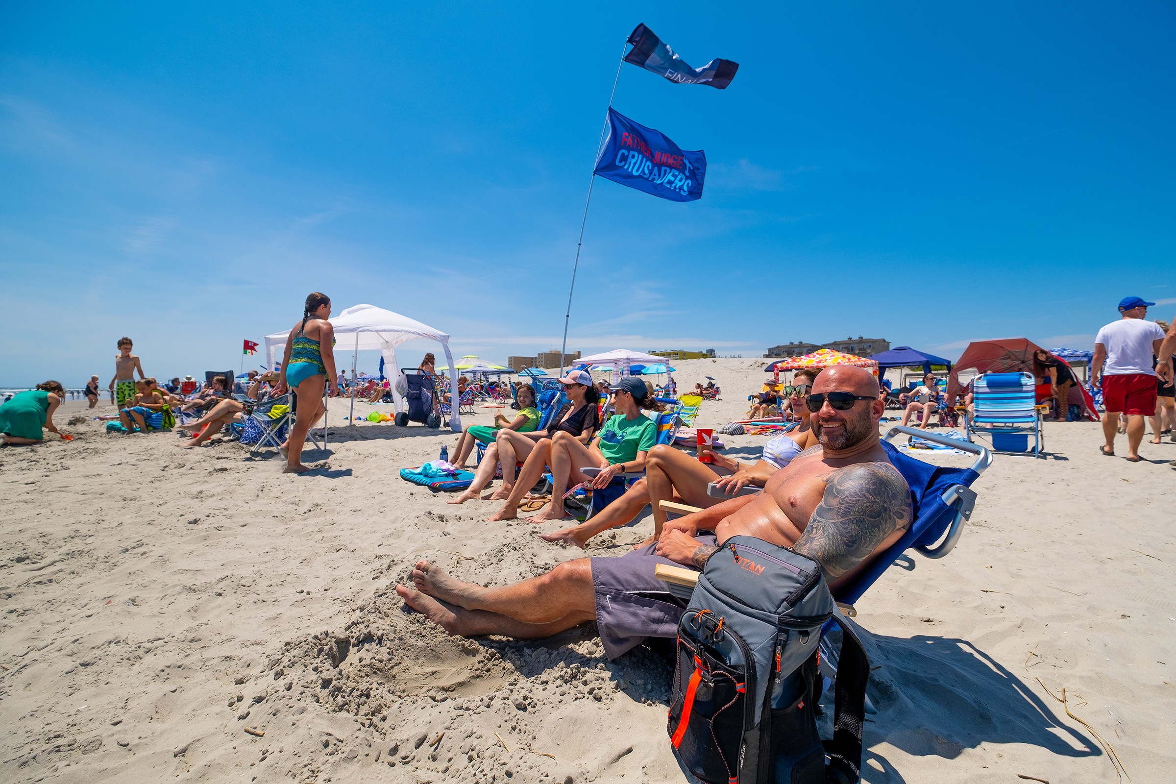 Beach flags proliferate at the Jersey Shore, pushing politics, professions, and help finding lost kids pic image