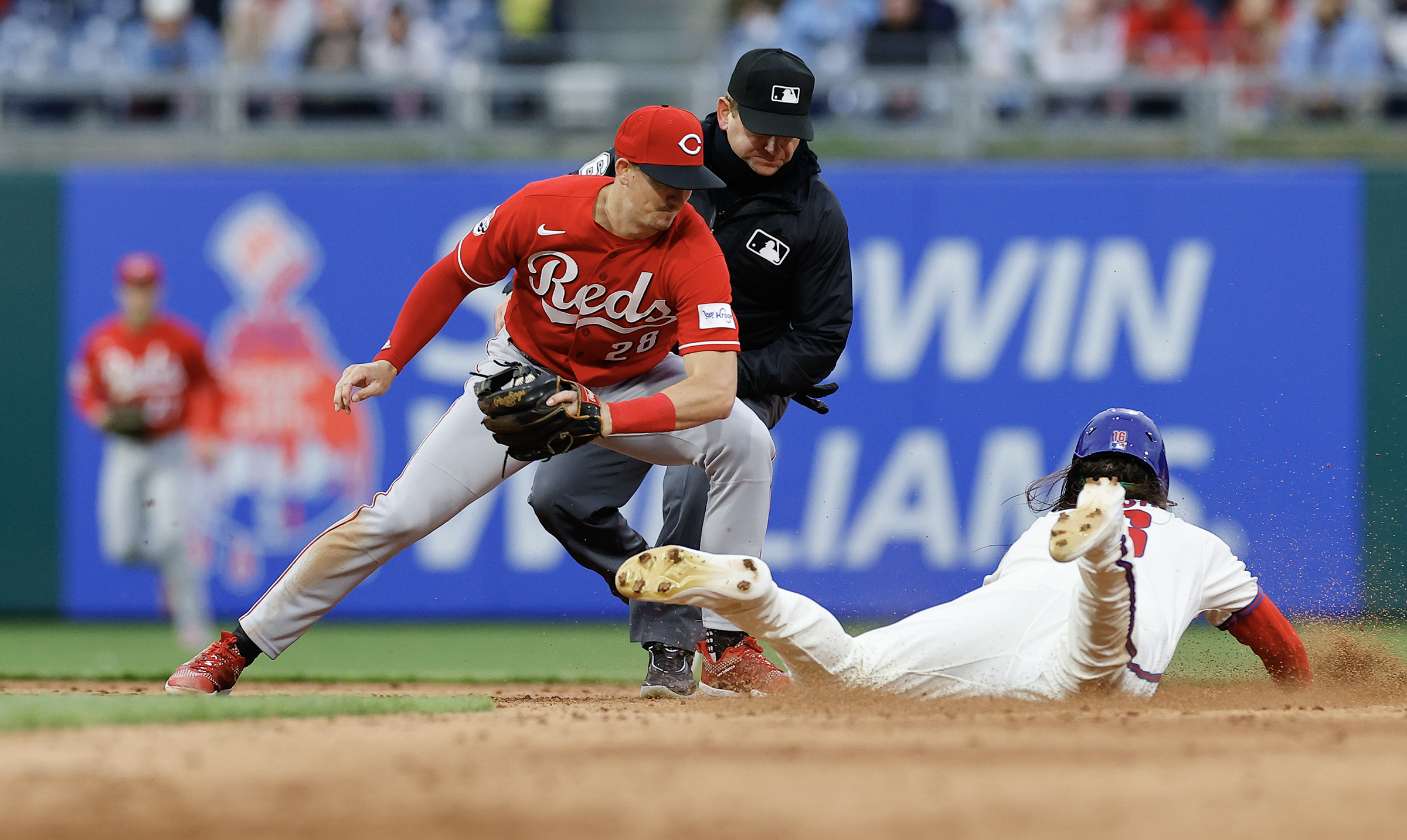 A ninth-inning rally fuels a 3-2 Phillies win over the Reds and revives a  packed Citizens Bank Park