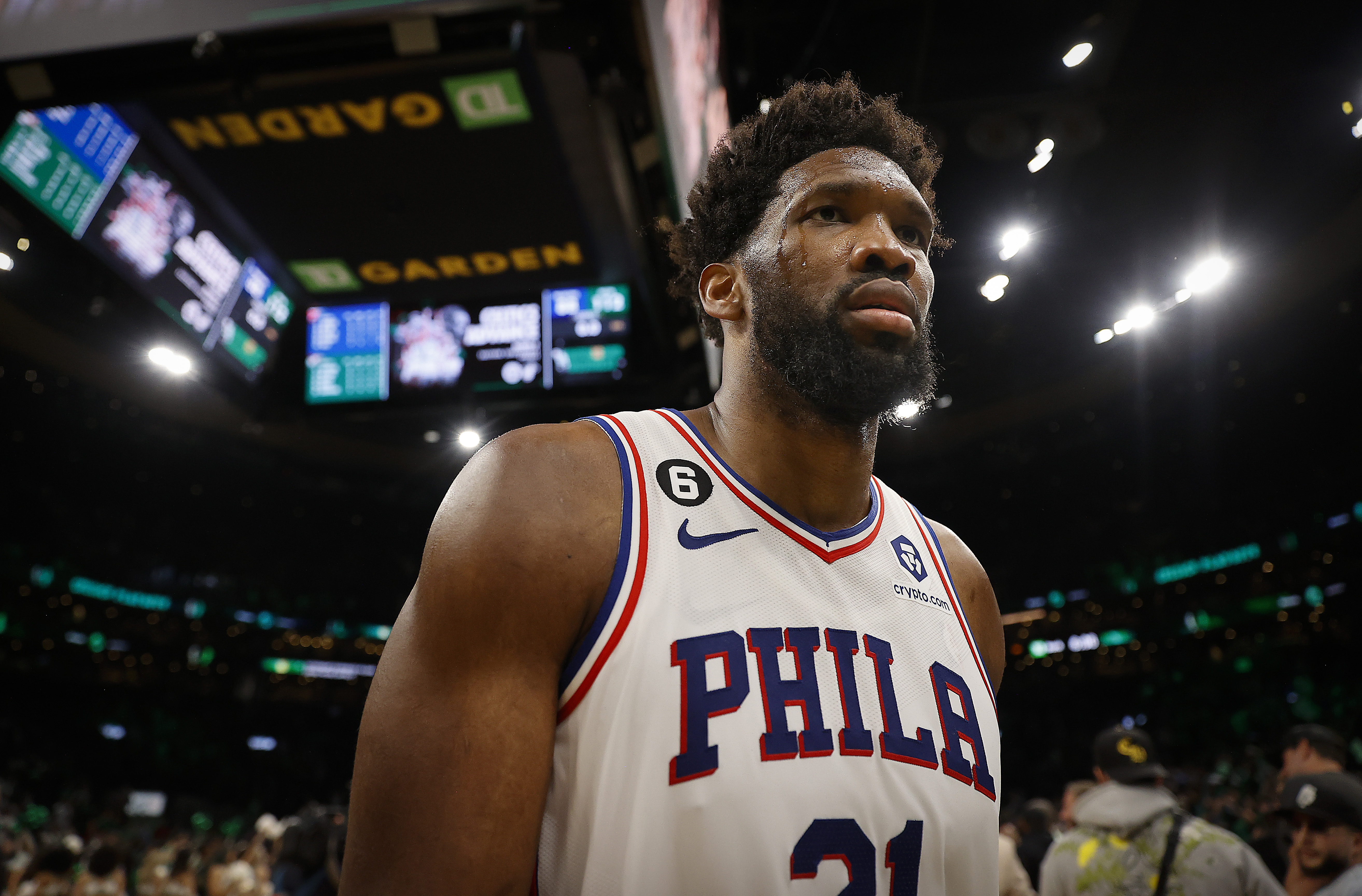 Joel Embiid basketball, Jalen Hurts football and Bryce Harper bat