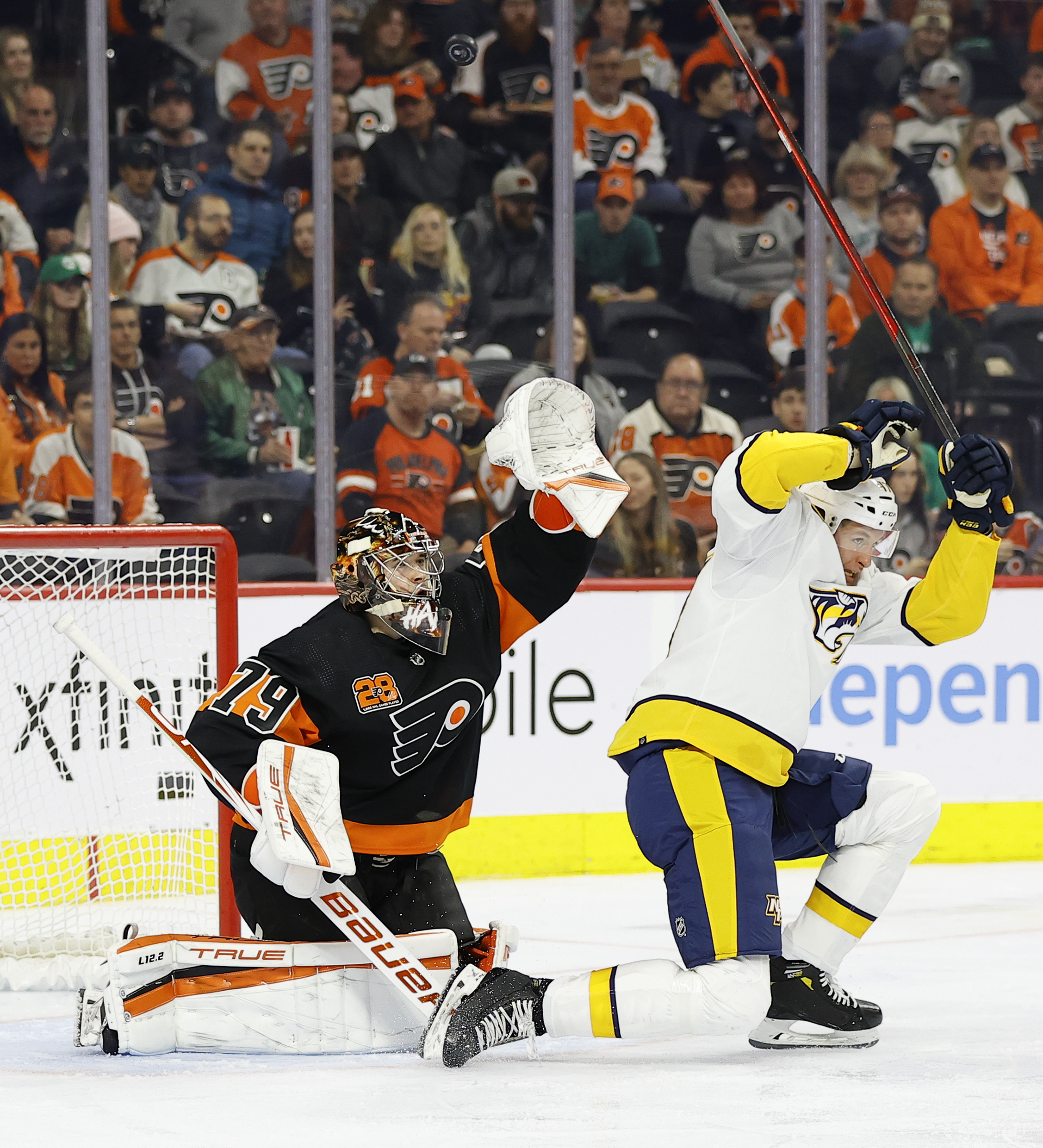 Philadelphia Flyers' Claude Giroux, right, and Travis Konecny celebrate  Giroux's goal during the third period of an NHL hockey game against the  Pittsburgh Penguins, Monday, May 3, 2021, in Philadelphia. (AP Photo/Matt