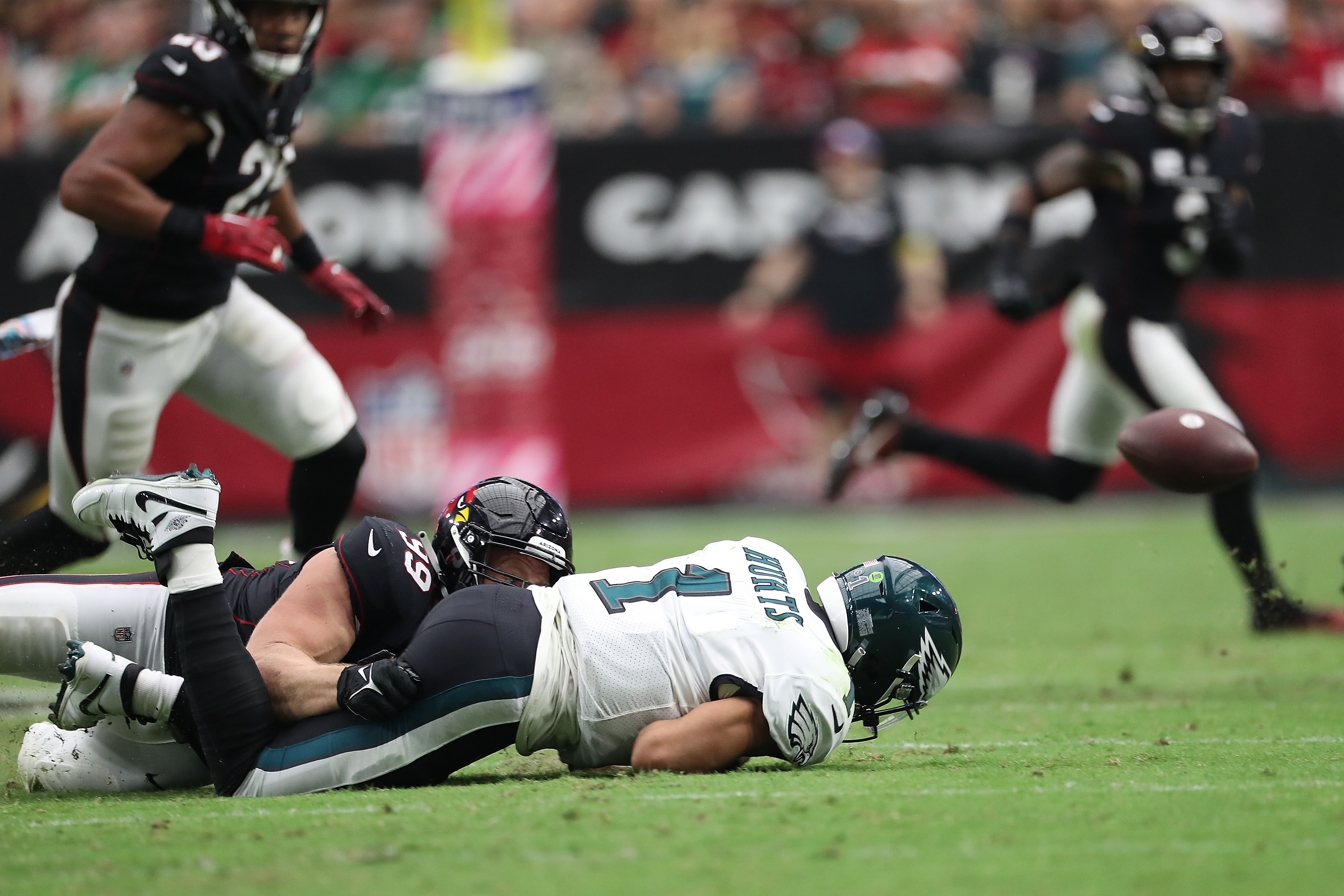 An Philadelphia Eagles fans cheers during the second half an NFL football  game between the Philadelphia Eagles and the Arizona Cardinals, Sunday, Oct.  9, 2022, in Glendale, Ariz. (AP Photo/Ross D. Franklin