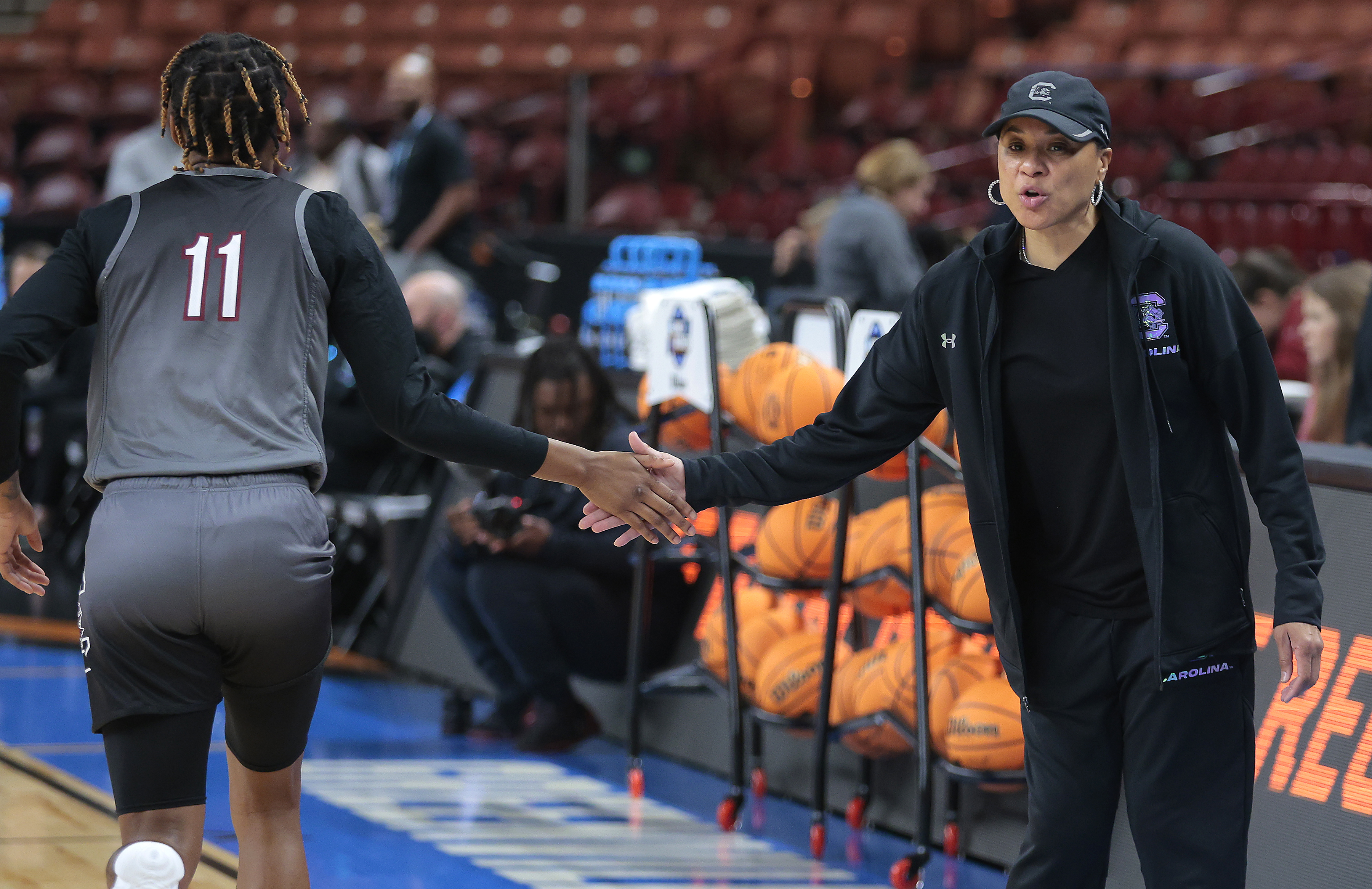 March Madness: Dawn Staley's wears a Cheyney jersey while coaching