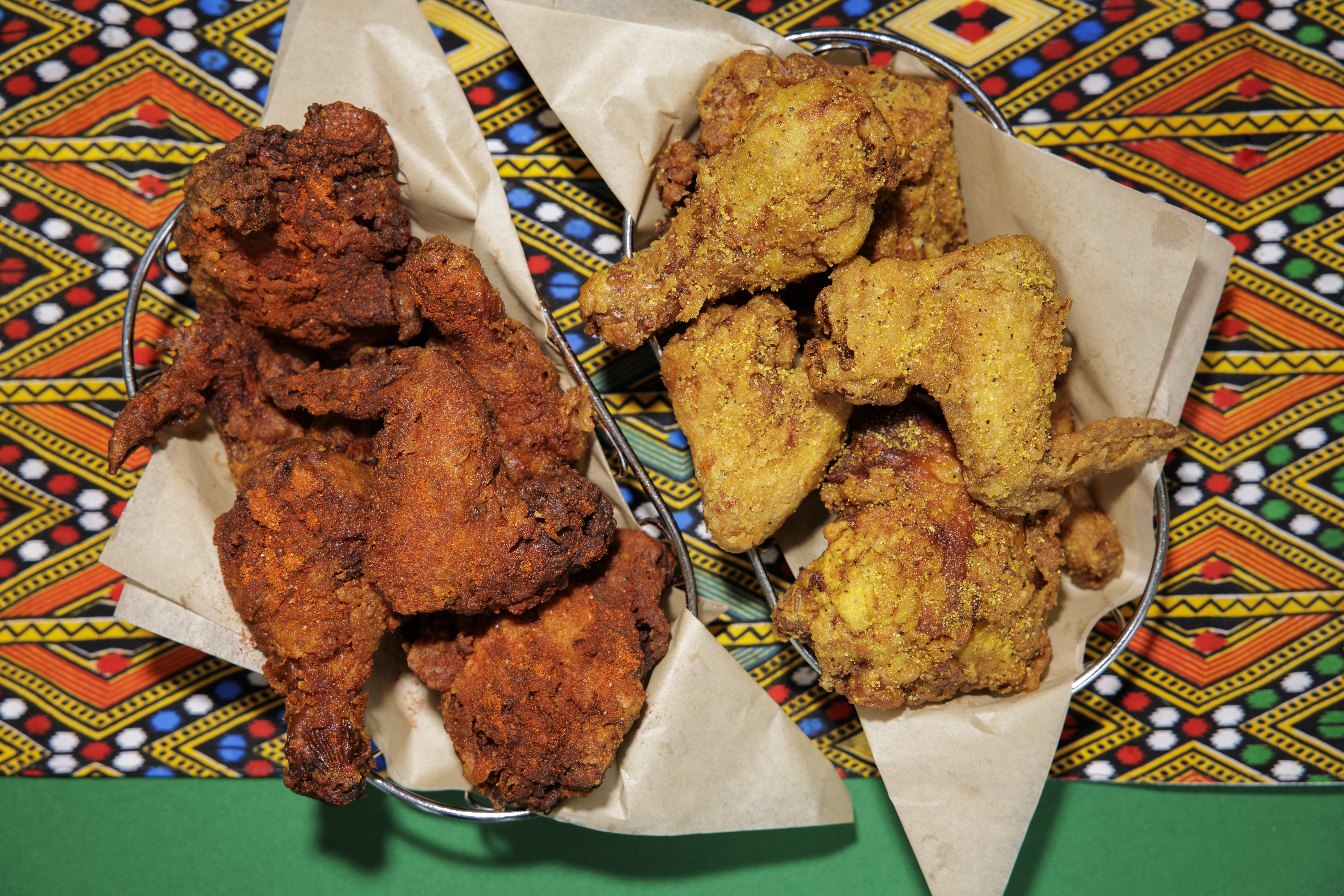 Awaze Spicy Berbere fried chicken and Alicha Lemon Turmeric fried chicken at Doro Bet in Philadelphia on Thursday, Aug. 15, 2024. Food Styling by Emilie Fosnocht