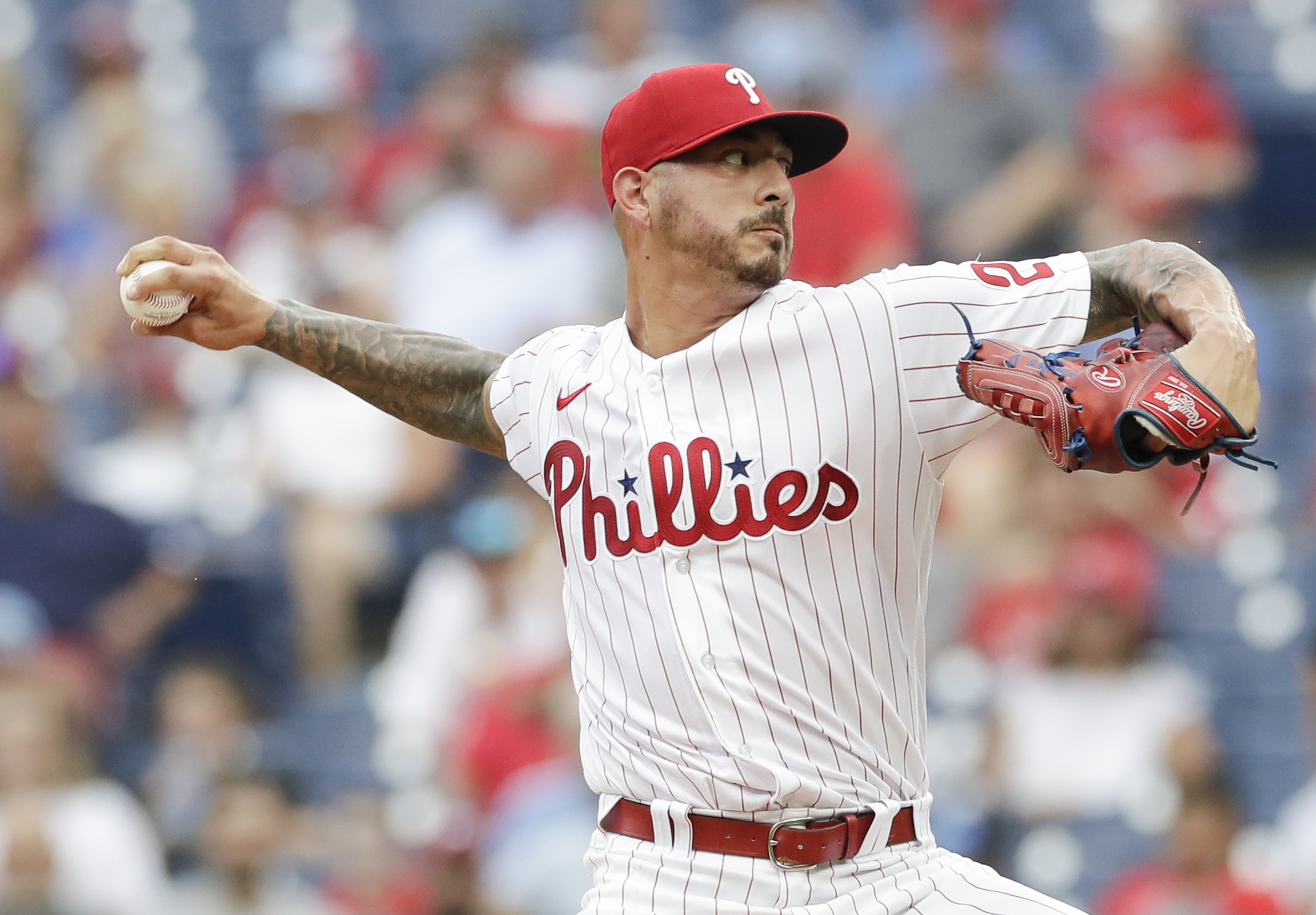 Oswalt leaves with back injury as Phillies fall to Marlins