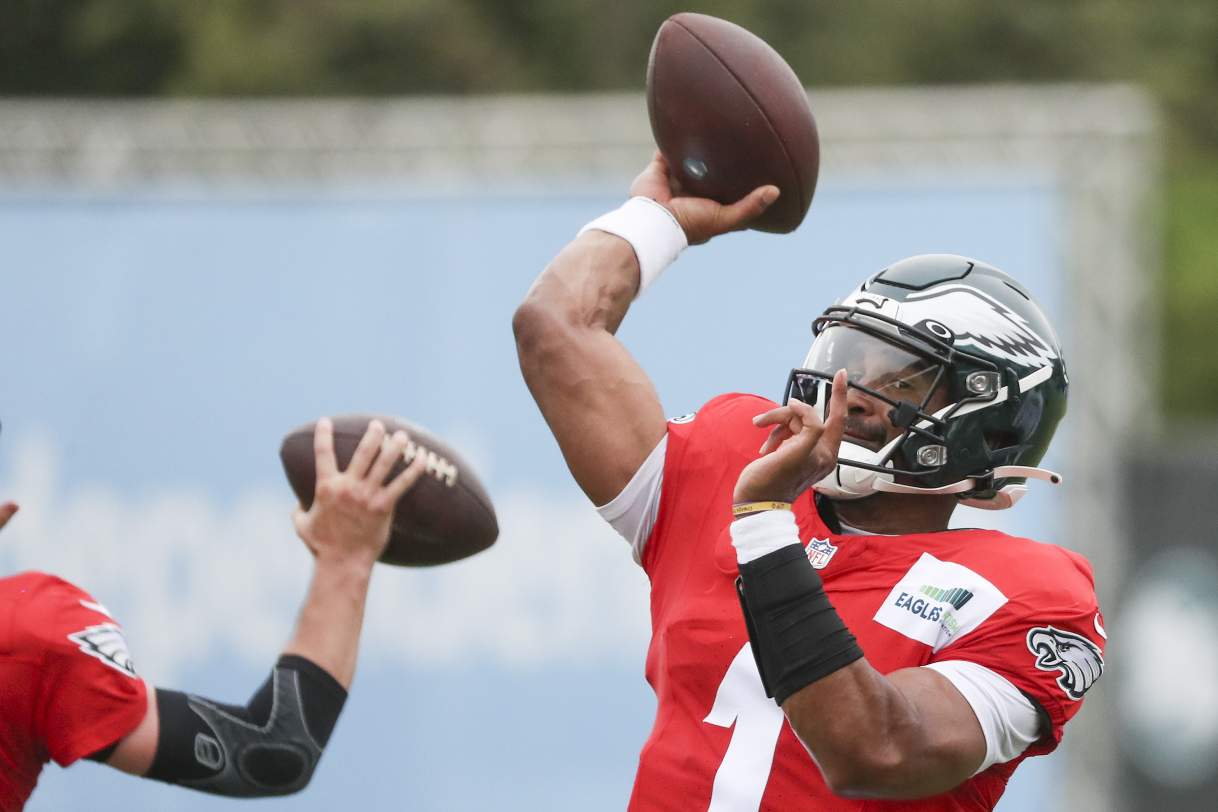 Eagles quarterback Jalen Hurts (1) throws the ball during training camp at the NovaCare Complex in South Philadelphia on Tuesday, Aug. 3, 2021.