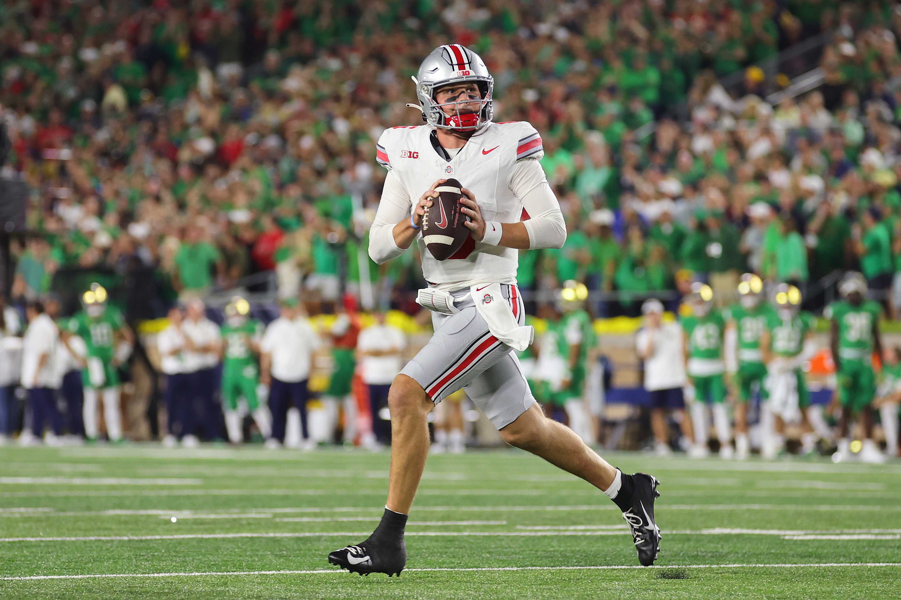 Former NFL quarterbacks Phil, Chris and Matt Simms combined their