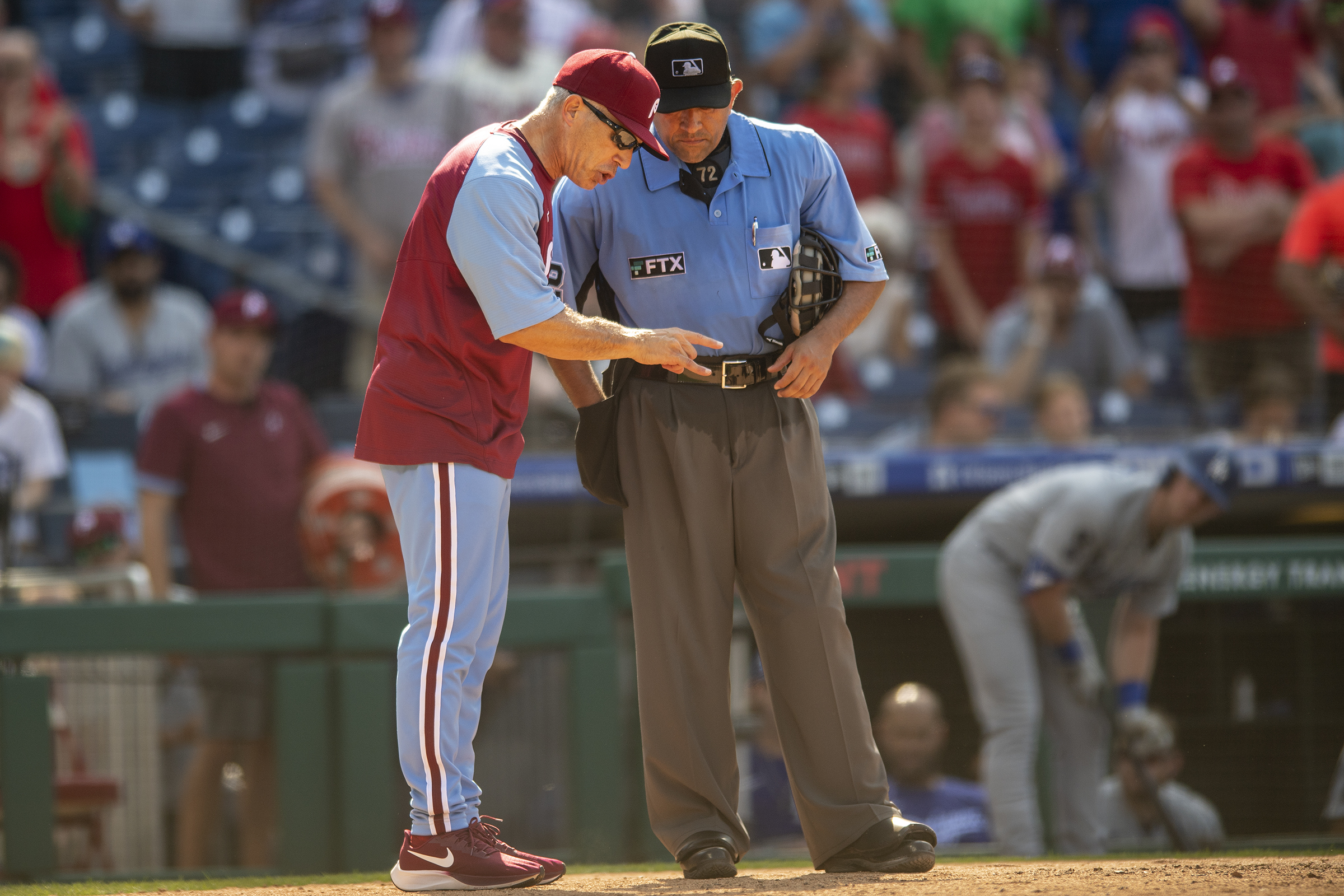 meaning of ftx on umpire shirt