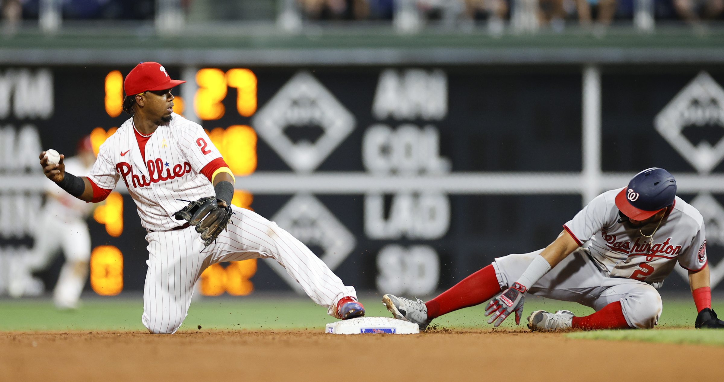 J.T. Realmuto and Edmundo Sosa's bats help Phillies hold on for  series-opening win against the Nationals