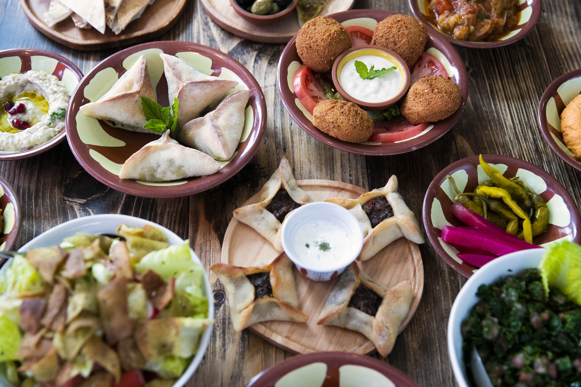 An array of Mezza dishes, both cold and hot, sit on a table at Li Beirut restaurant in Collingswood, NJ on Tuesday, March 23, 2021. Li Beirut is a new Lebanese restaurant on Collings Avenue.