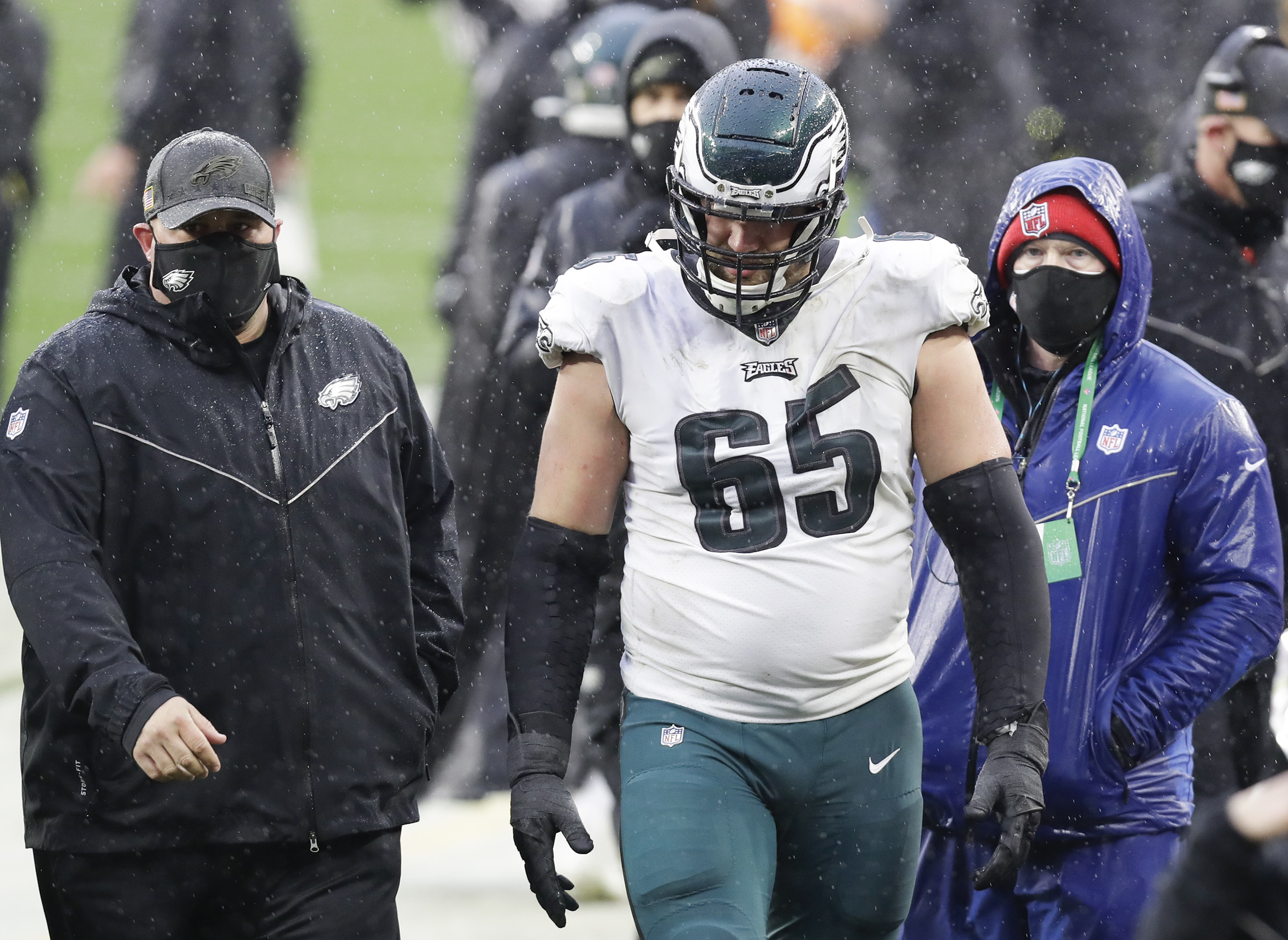 Philadelphia Eagles offensive tackle Lane Johnson (65) walks off