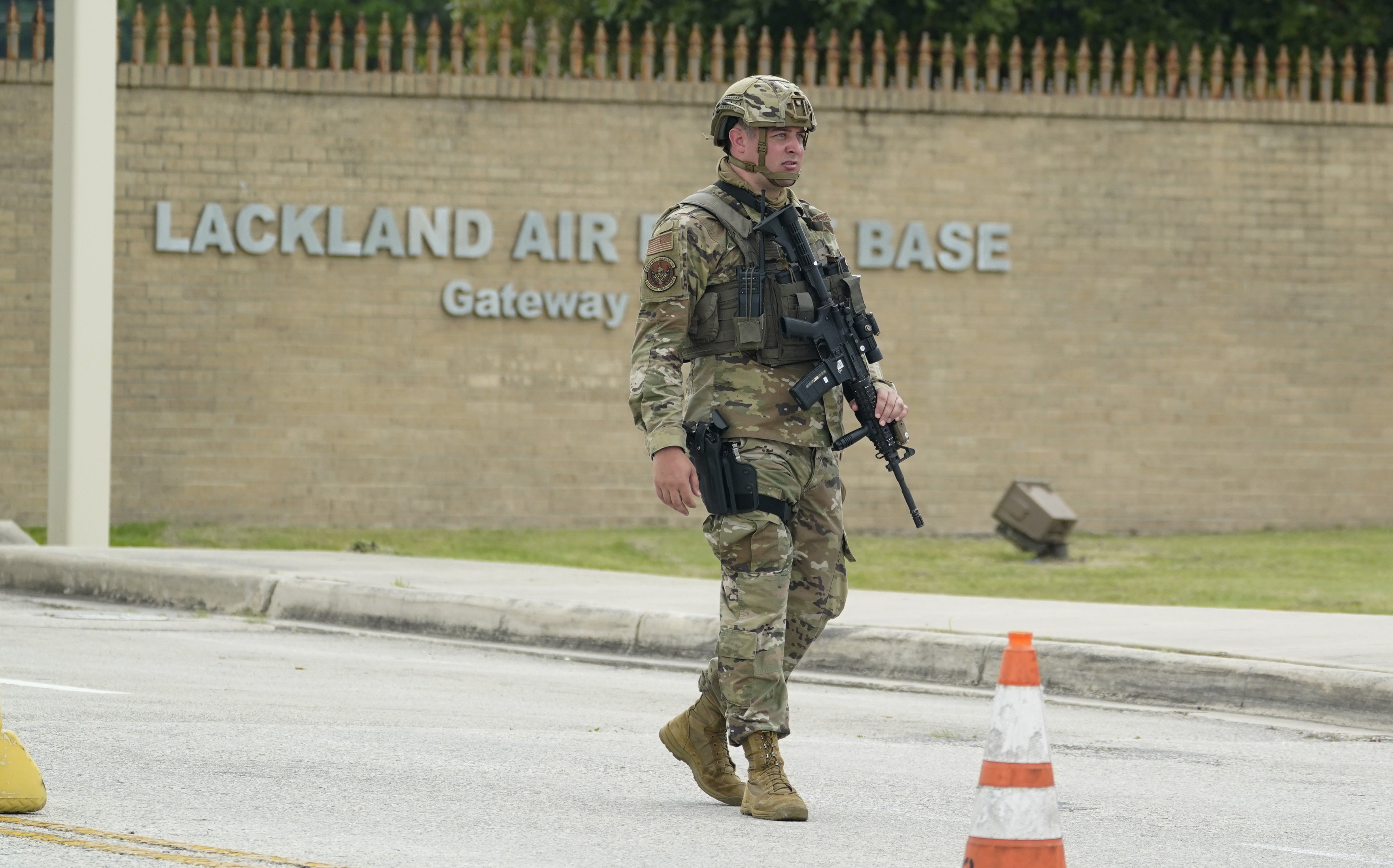A San Antonio Air Force base was locked down for an hour after gunfire was  reported nearby