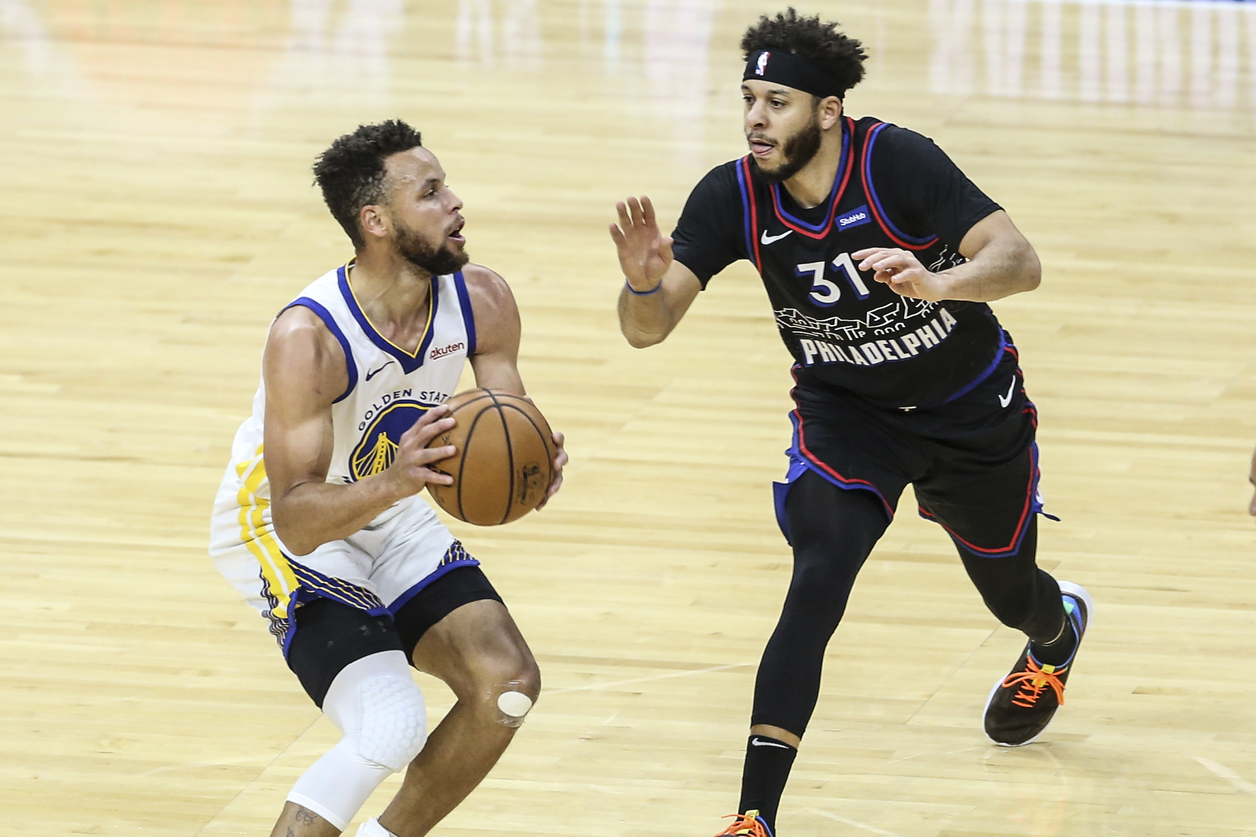 Steph Curry is the difference as the Warriors snapped the Sixers' four-game  win streak