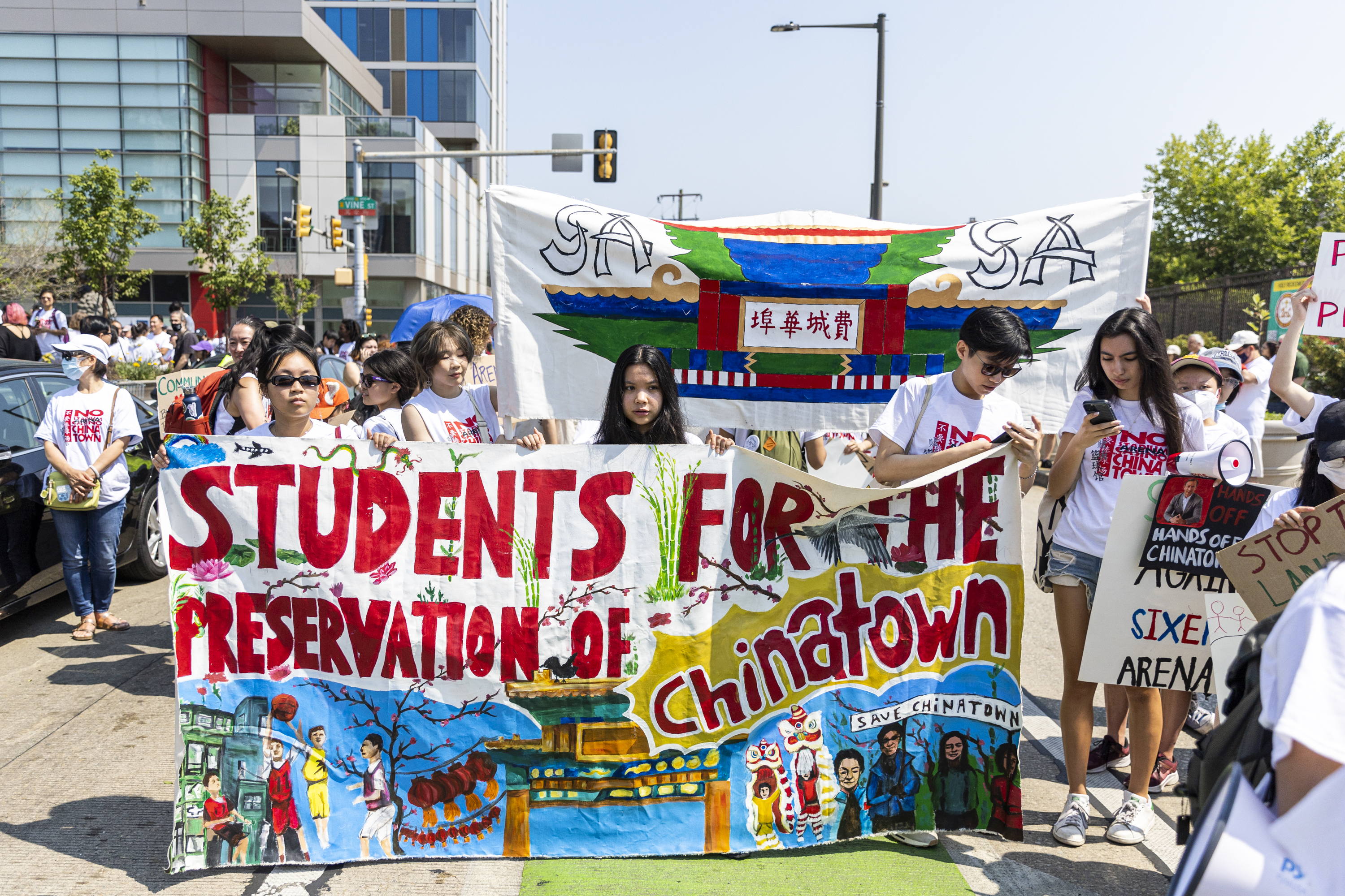 Students protest 76ers stadium proposal in Chinatown outside of Board of  Trustees meeting