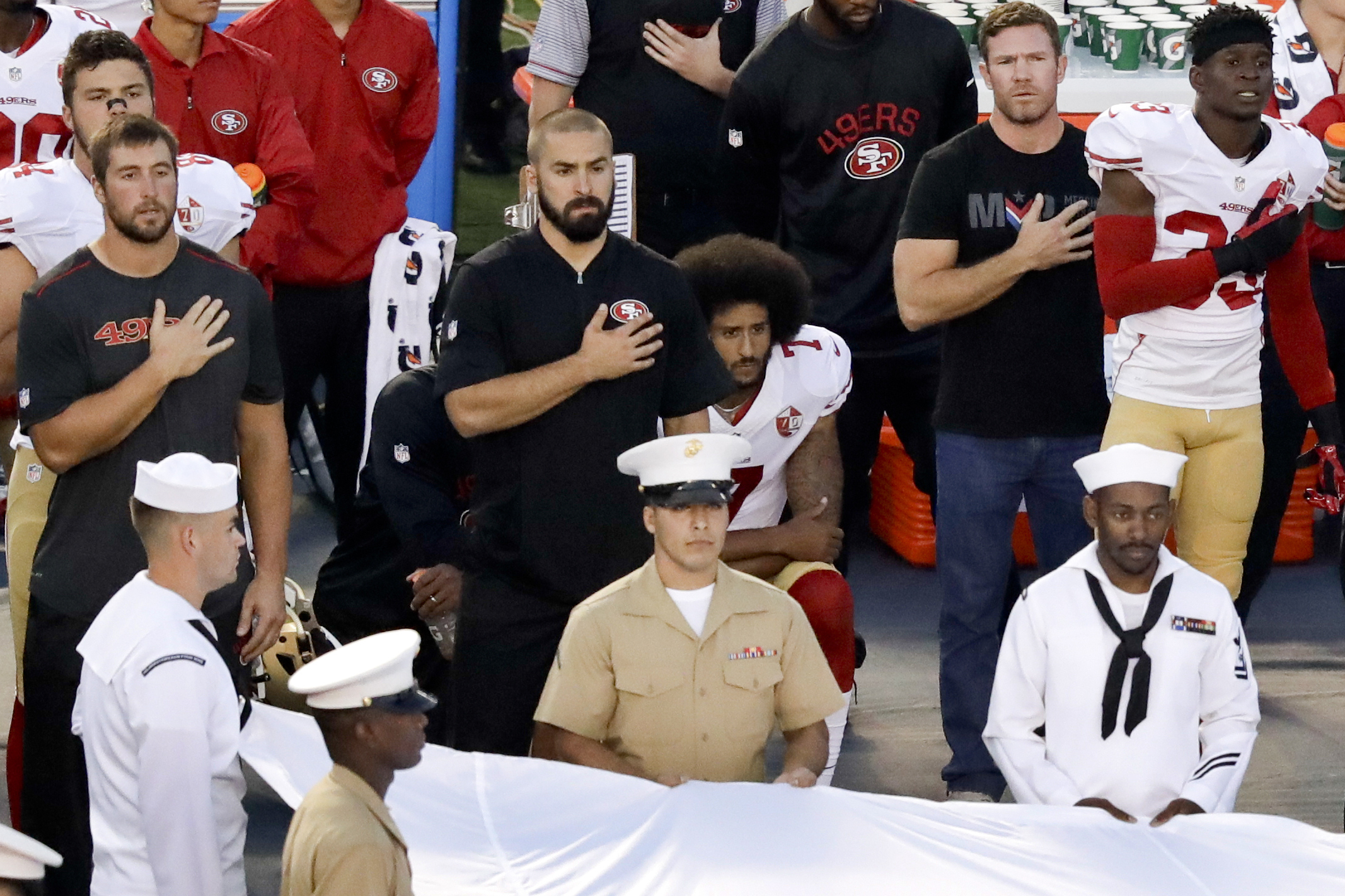 Kaepernick kneeling outlet on trump shirt