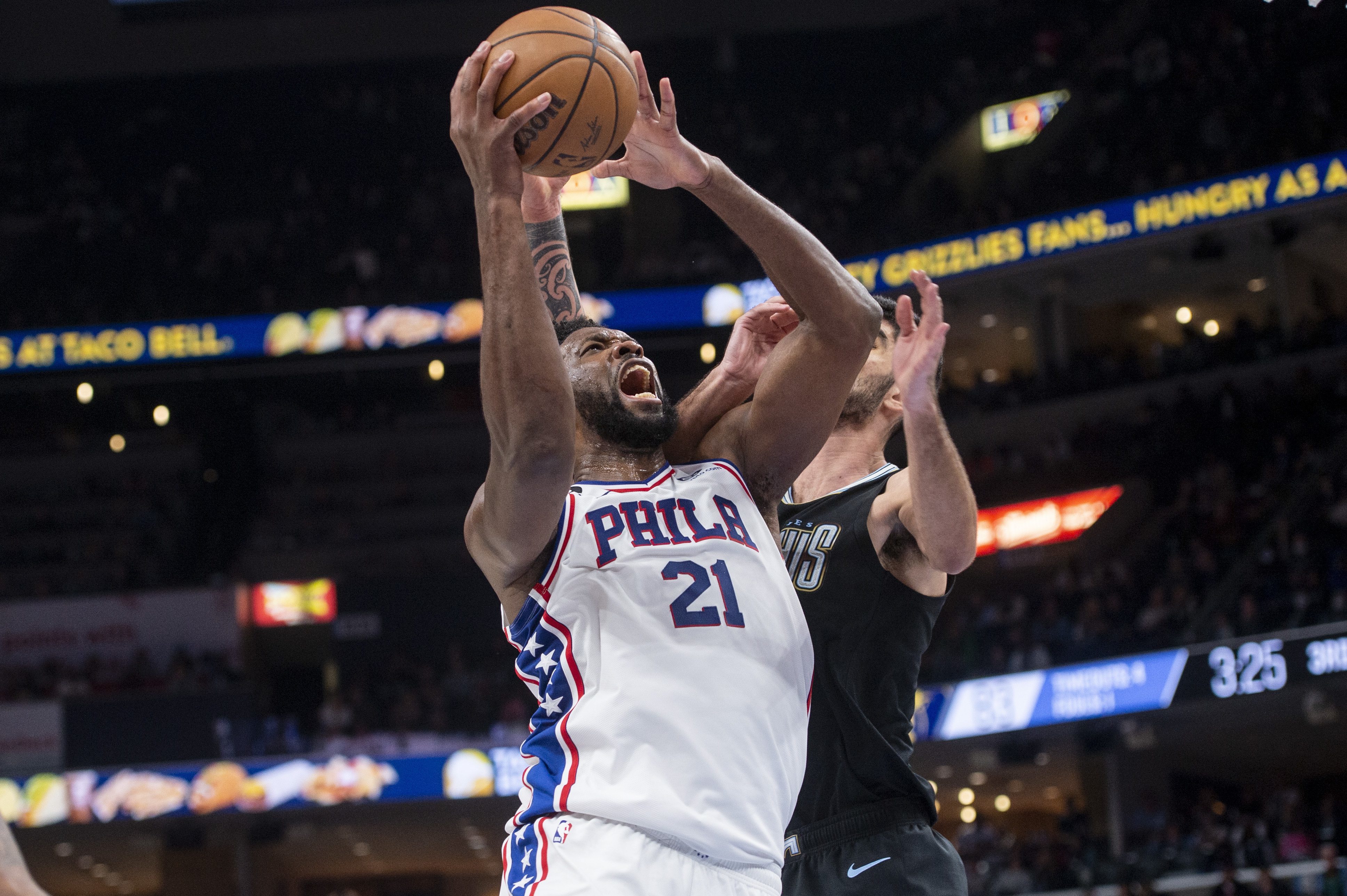 Photos of the shorthanded Sixers' loss to the Grizzlies