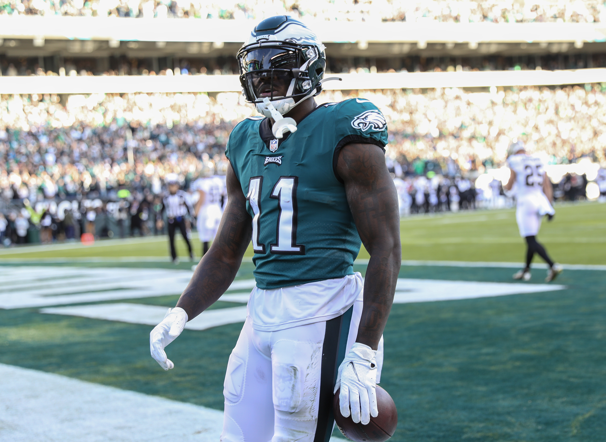 Hurts, Eagles clinch playoff spot with win over fading Giants