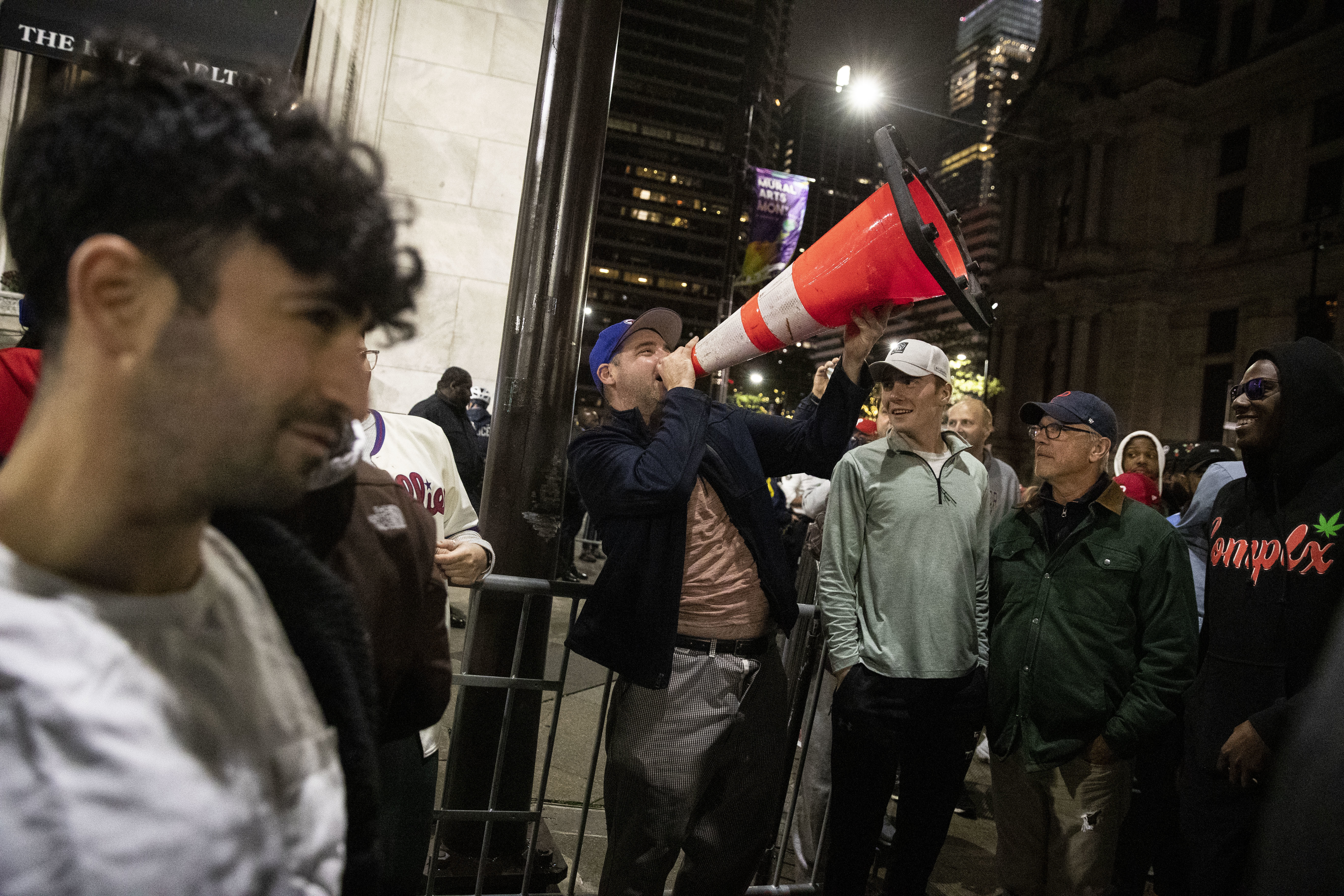 Video: Phillies fans climbing poles outside City Hall after NLCS win - CBS  Philadelphia