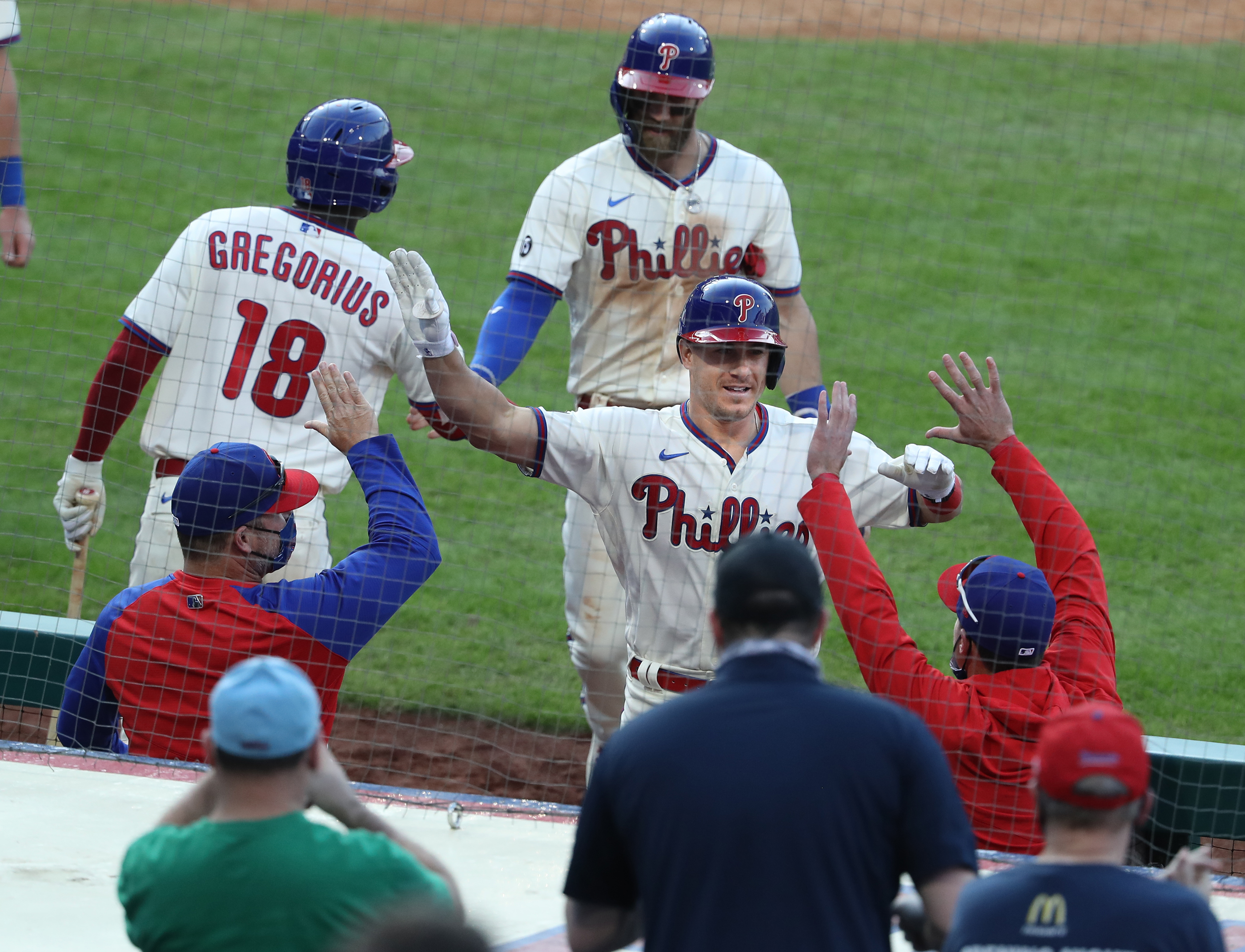 Philadelphia Phillies - J.T. Realmuto and Bryce Harper celebrating J.T.'s  home run.