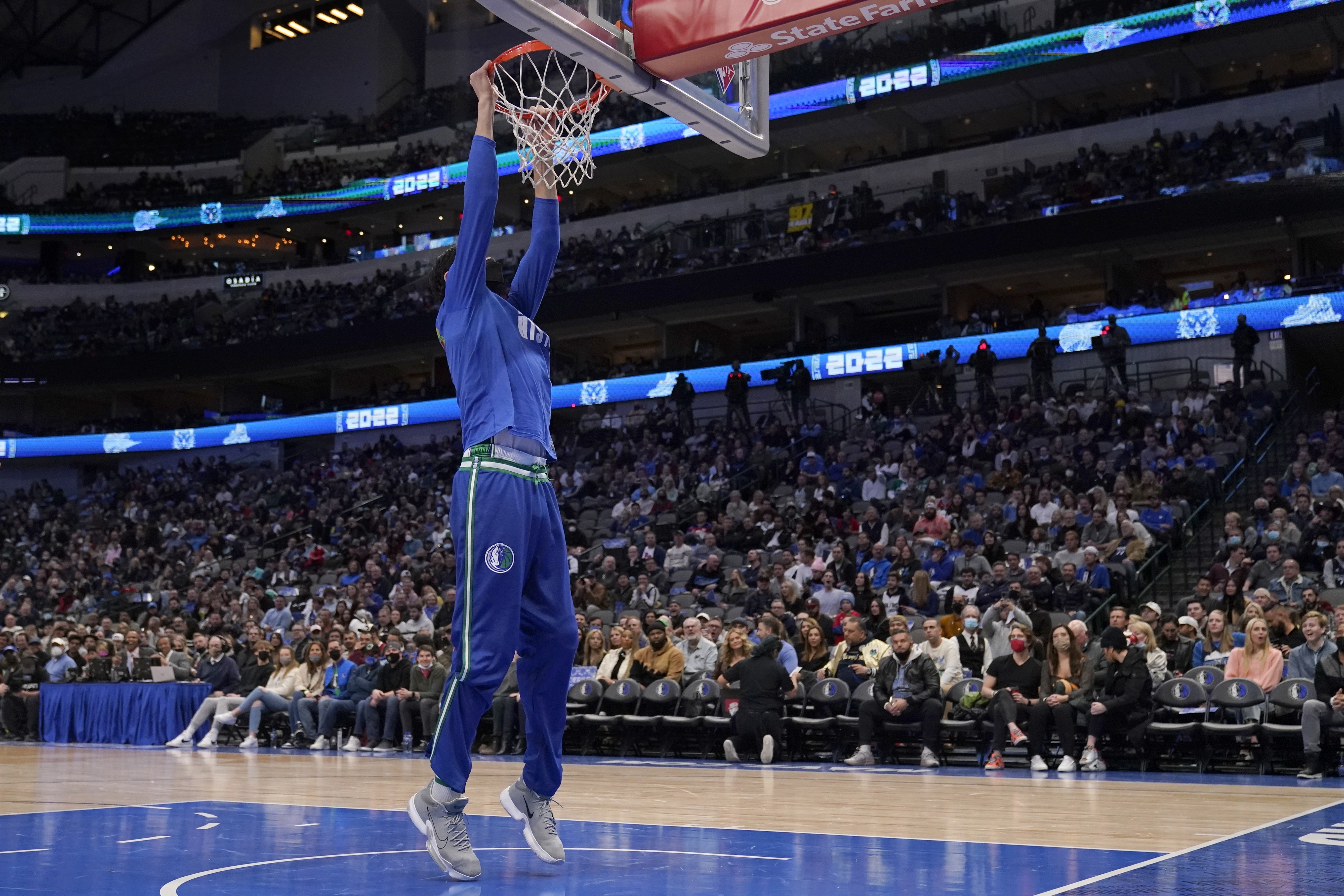 Boban Marjanovic and Luka Doncic of the Dallas Mavericks shake