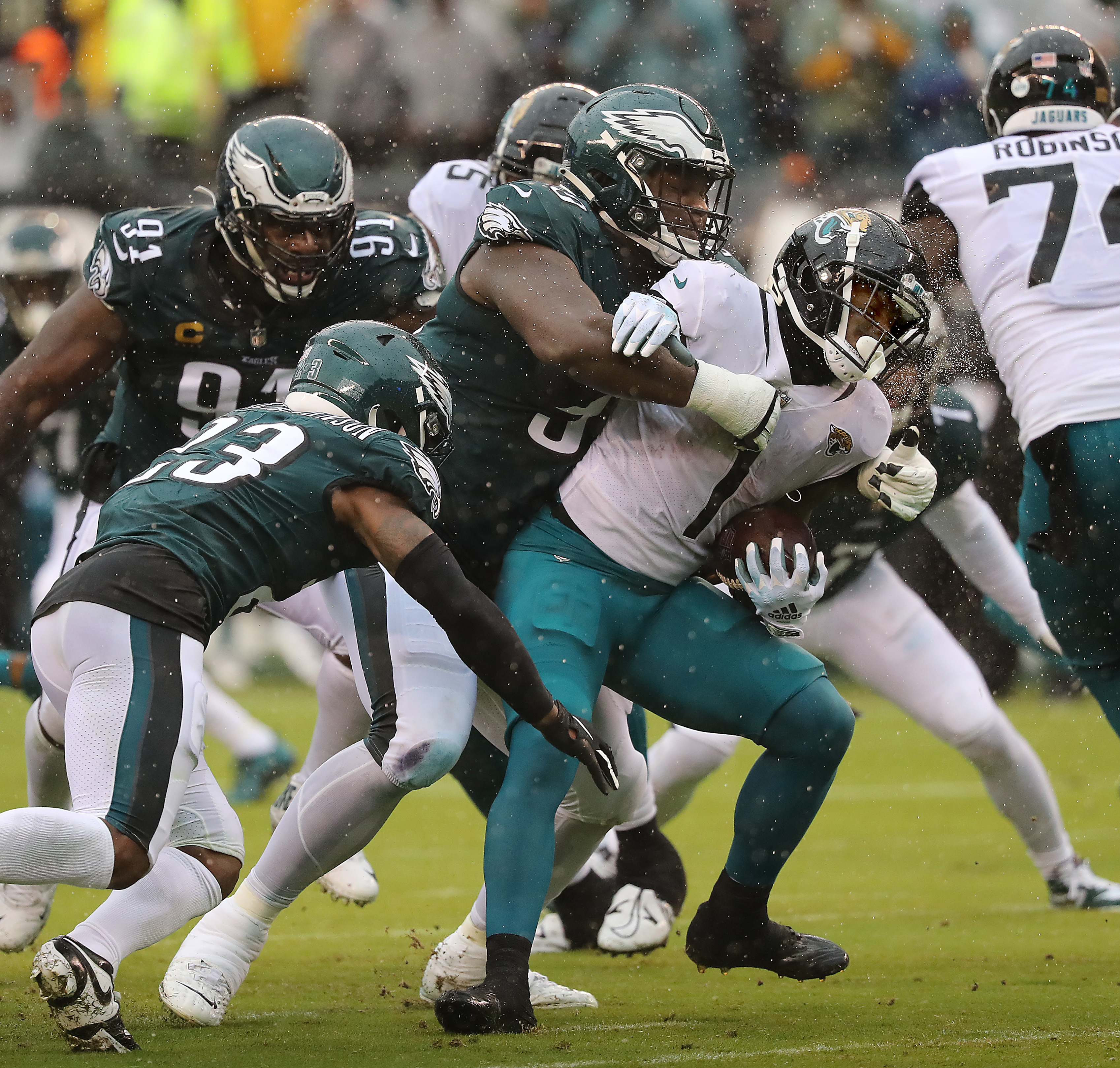 Miles Sanders has career day as Eagles' battered O-line survives the  driving Jaguars and rain