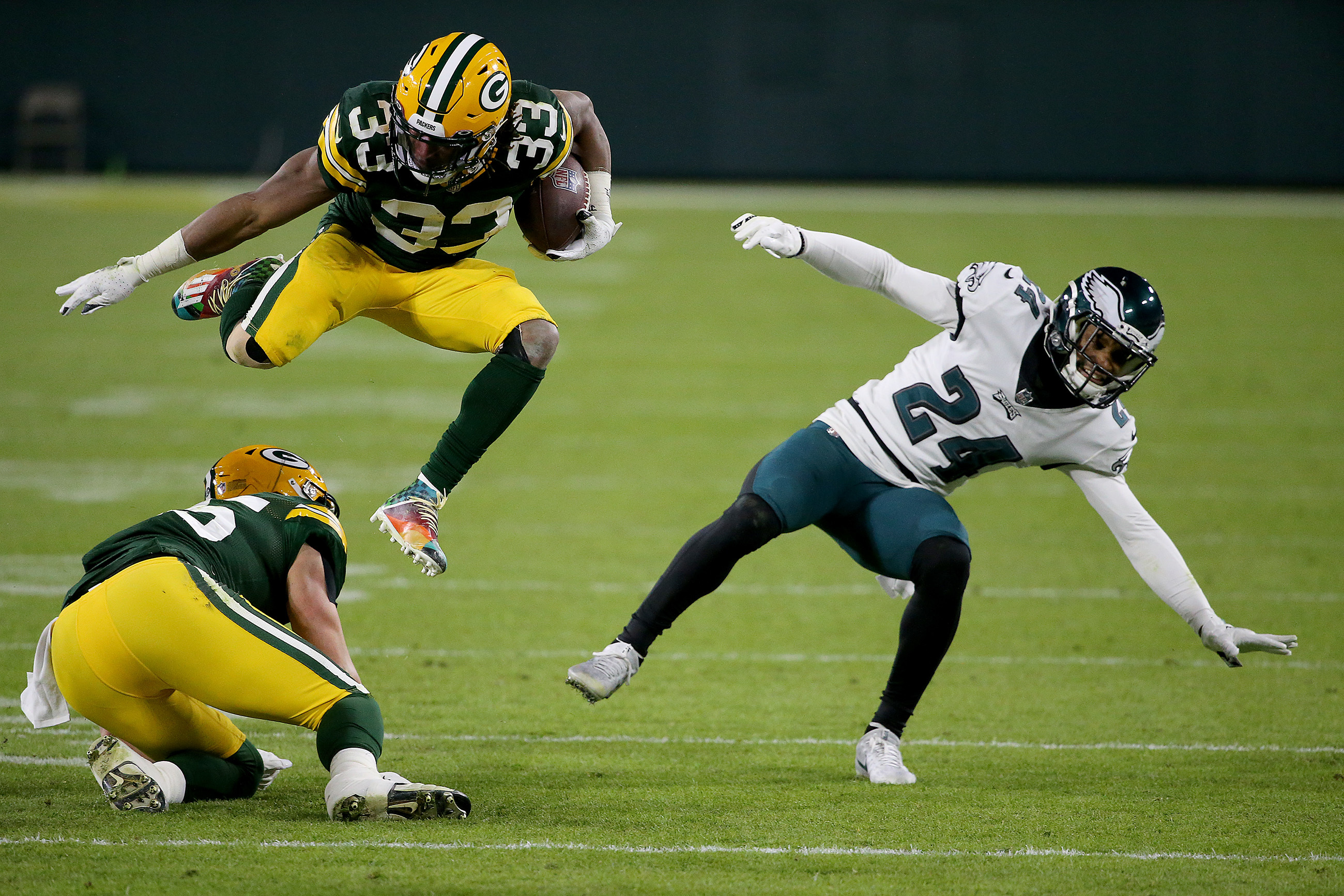 Aaron Jones of the Green Bay Packers avoids a tackle by Troy Hill of  News Photo - Getty Images