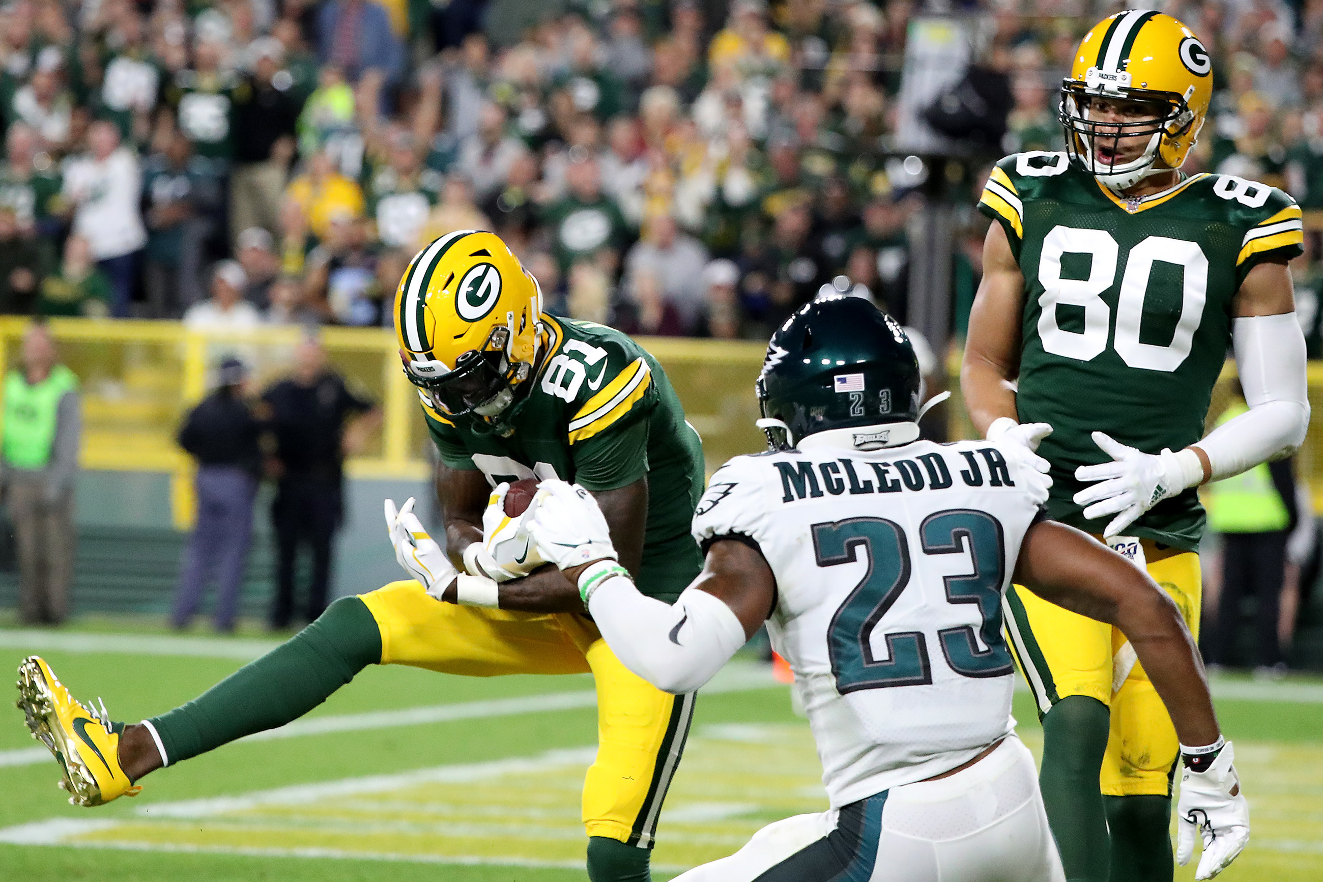 Packers' Davante Adams taken off field on stretcher after vicious hit