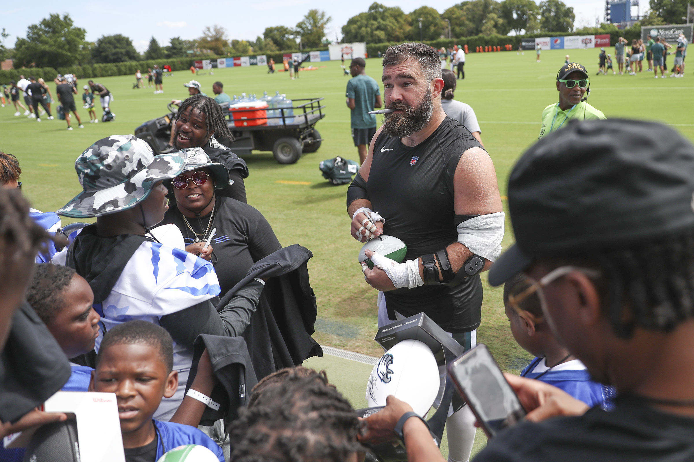 Philadelphia Eagles guard Isaac Seumalo (56) and center Landon Dickerson  (69) take part in drills at the Miami Dolphins' NFL football team's  practice facility, Thursday, Aug. 25, 2022, in Miami Gardens, Fla. (