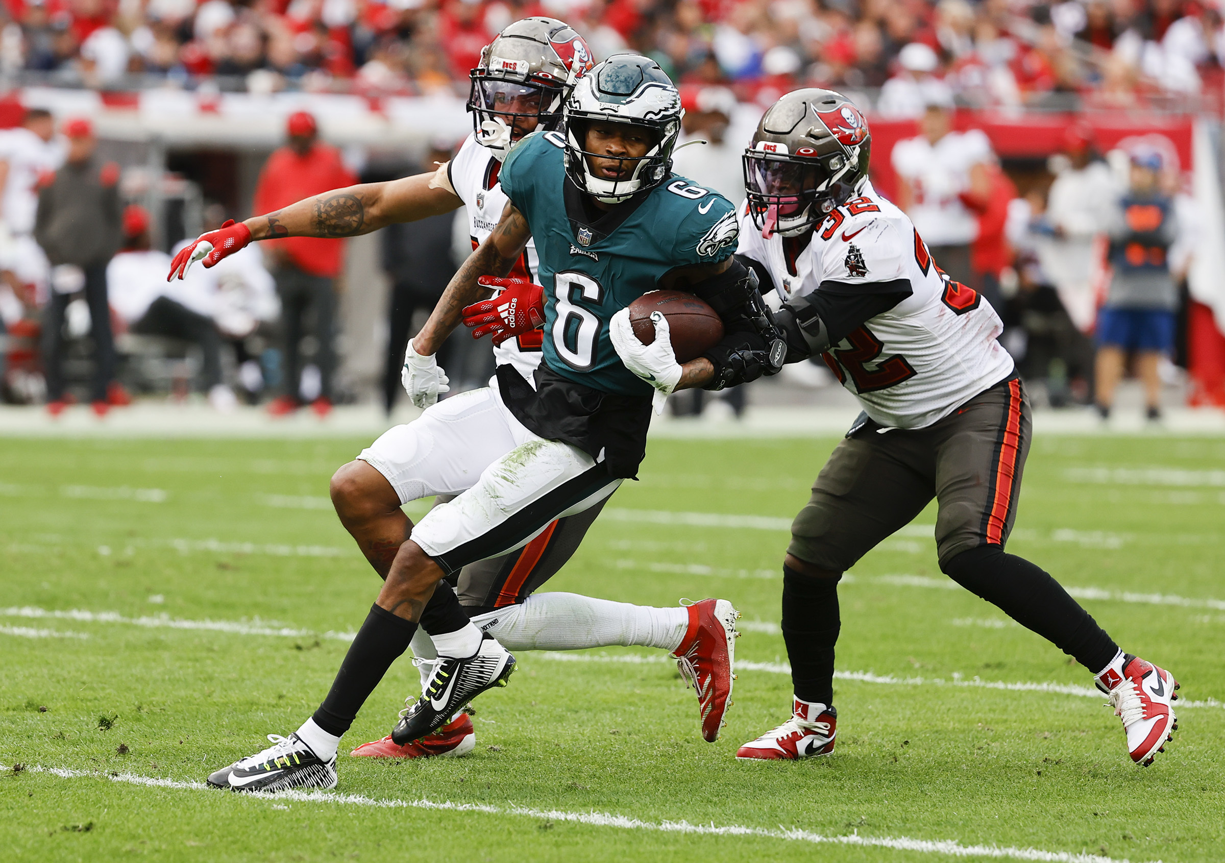 Philadelphia Eagles wide receiver DeVonta Smith (6) ,ales a catch against  Washington Commanders cornerback Benjamin St-Juste (25) during the first  half of an NFL football game, Sunday, Sept. 25, 2022, in Landover