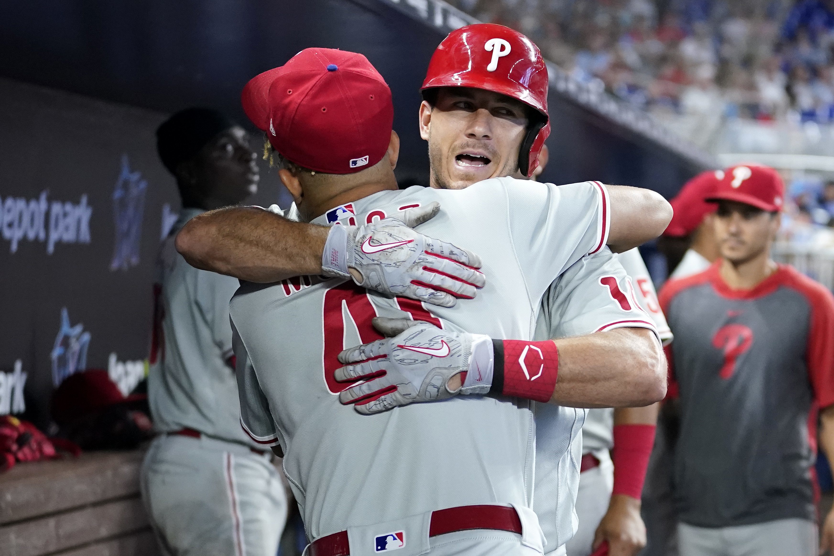 Philadelphia Phillies starting pitcher Ranger Suarez, left, walks with  catcher J.T. Realmuto, center, before a baseball game against the Miami  Marlins, Saturday, July 8, 2023, in Miami. (AP Photo/Lynne Sladky Stock  Photo 