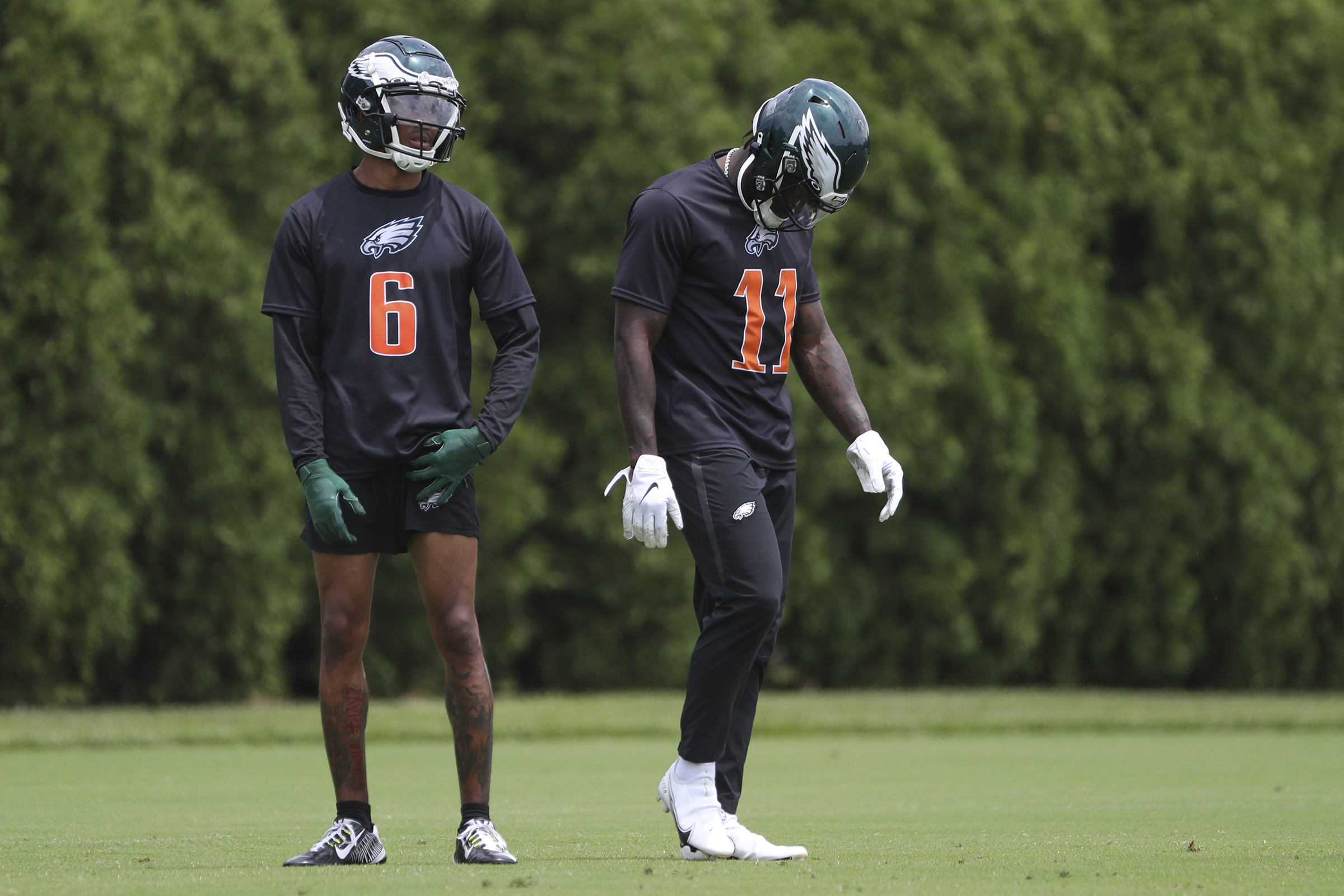 Eagles' Jalen Hurts connects with his receivers during OTA session