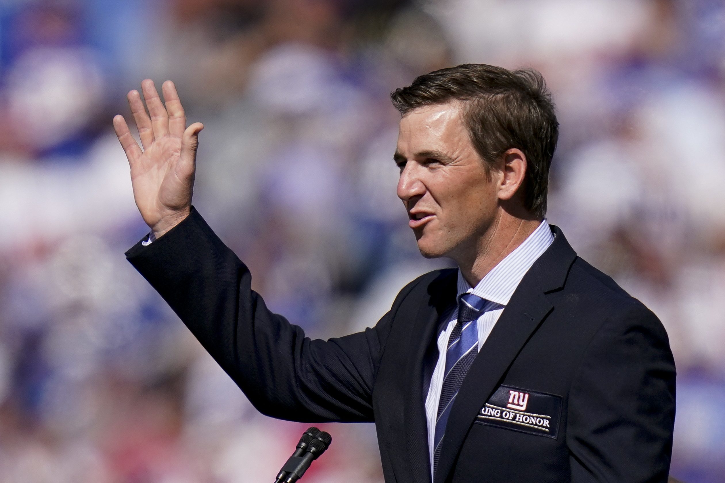 WATCH: Eli Manning presents Penn State walk-on Barney Amor a full  scholarship