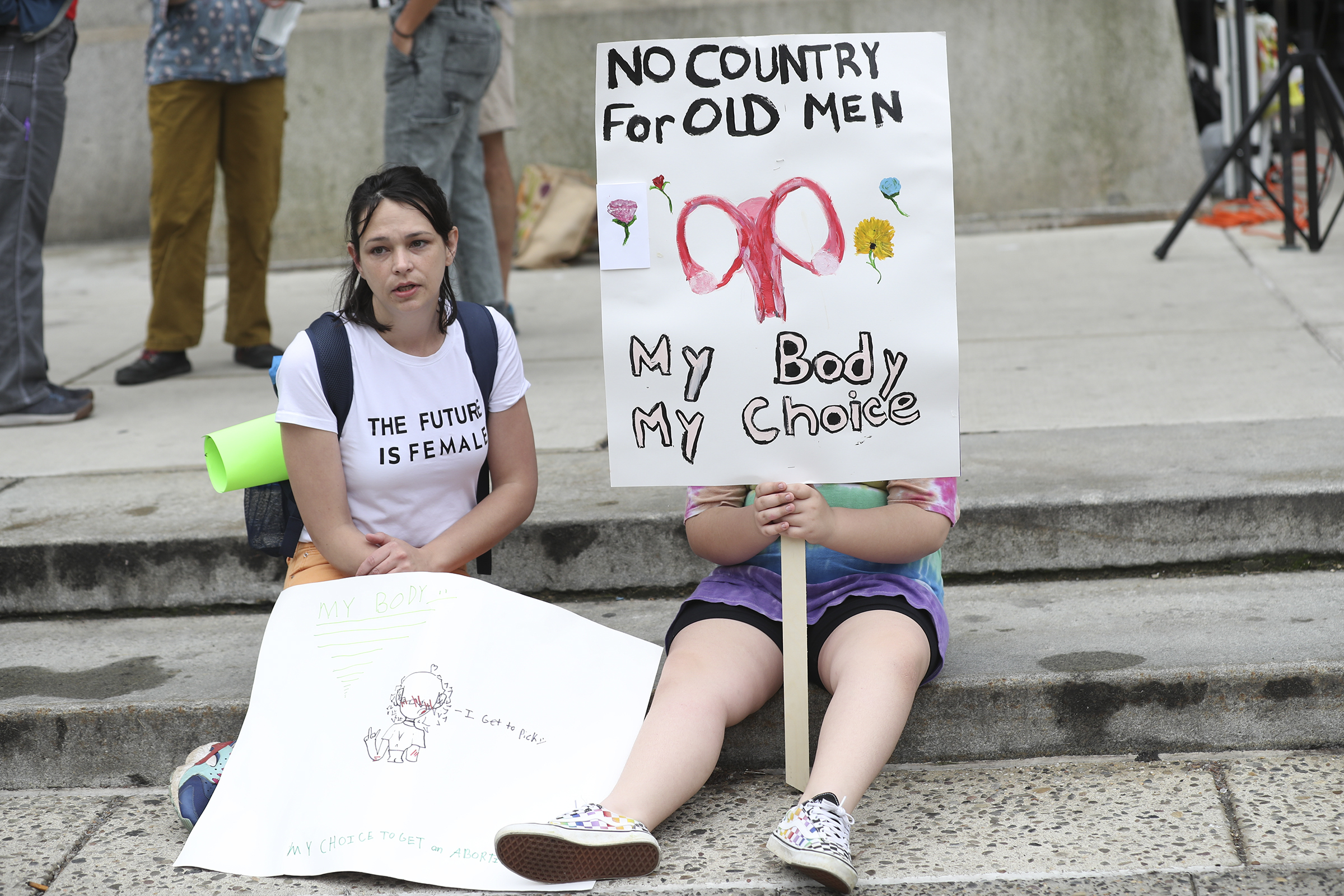 Photos of hundreds rallying in Philadelphia in support of abortion rights